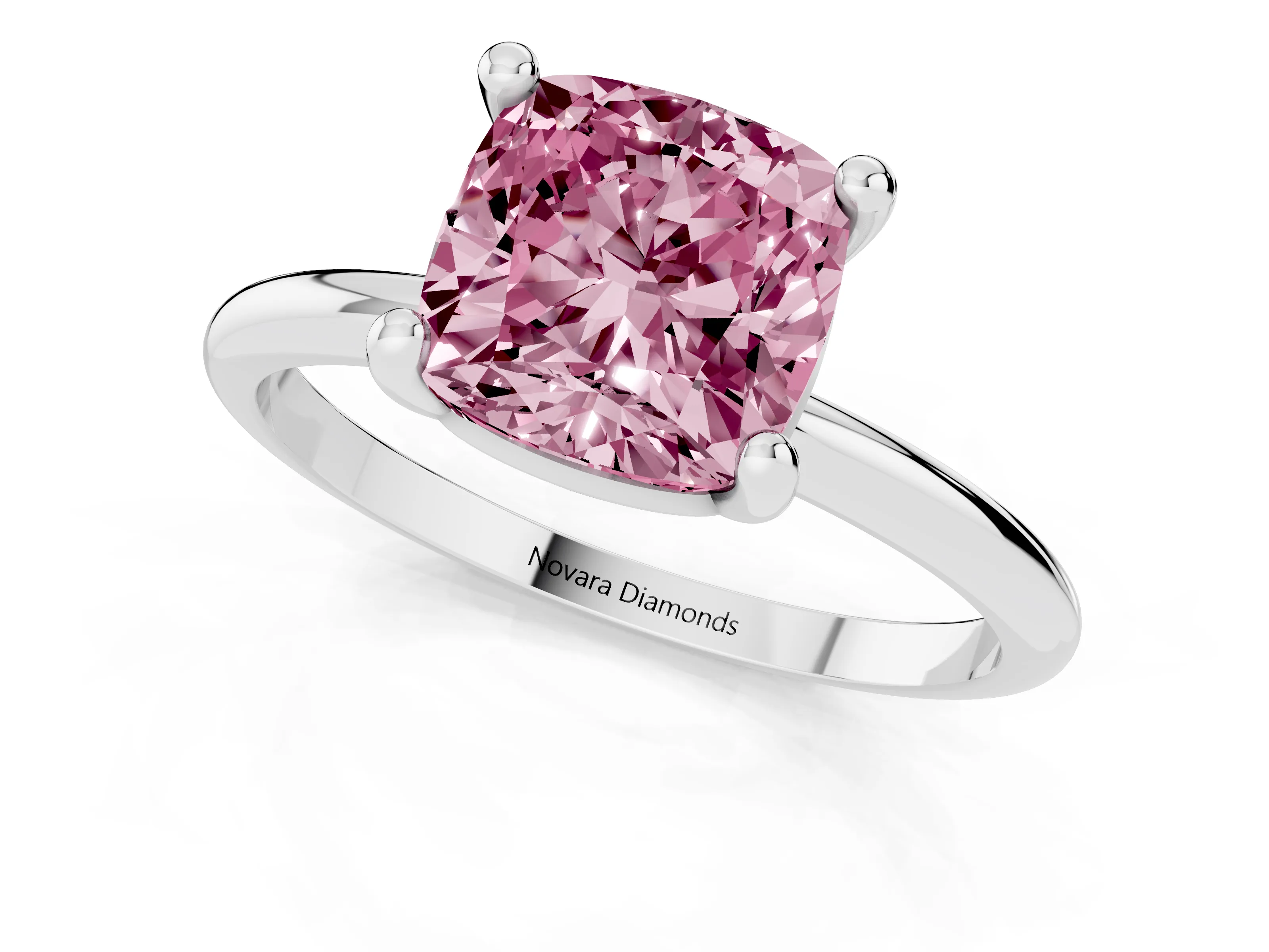 Fancy Pink Cushion Cut Diamond Solitaire Ring Set in Platinum with Secure Prong Setting on a Classic Band