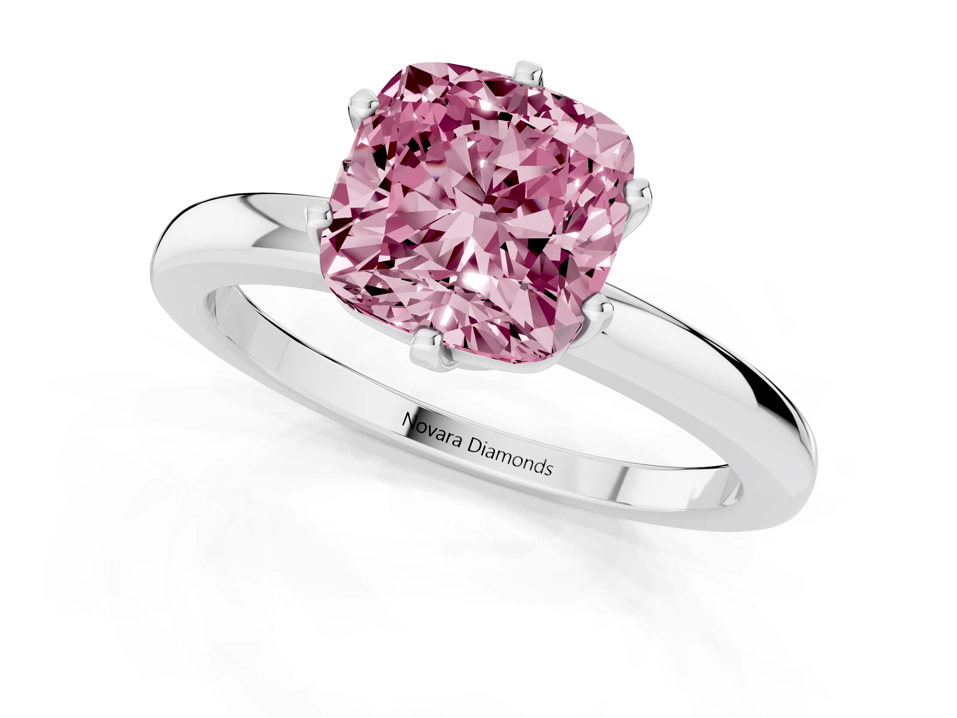 Fancy Pink Cushion Cut Diamond Solitaire Ring Set in Silver with Raised Prong Setting on a Classic Band