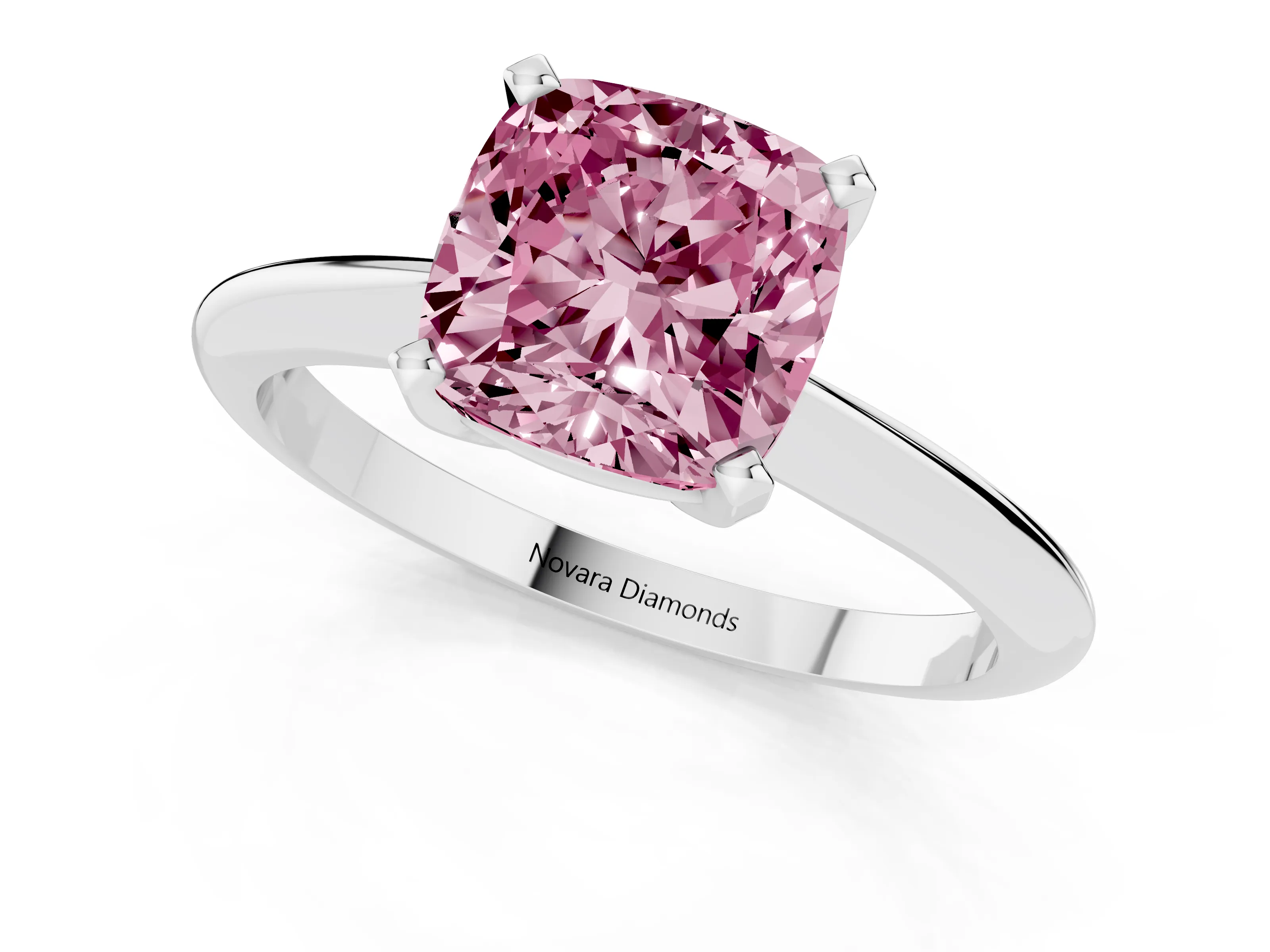 Fancy Pink Cushion Cut Diamond Solitaire Ring Set in Platinum with Prong Setting on a Plain Round Band