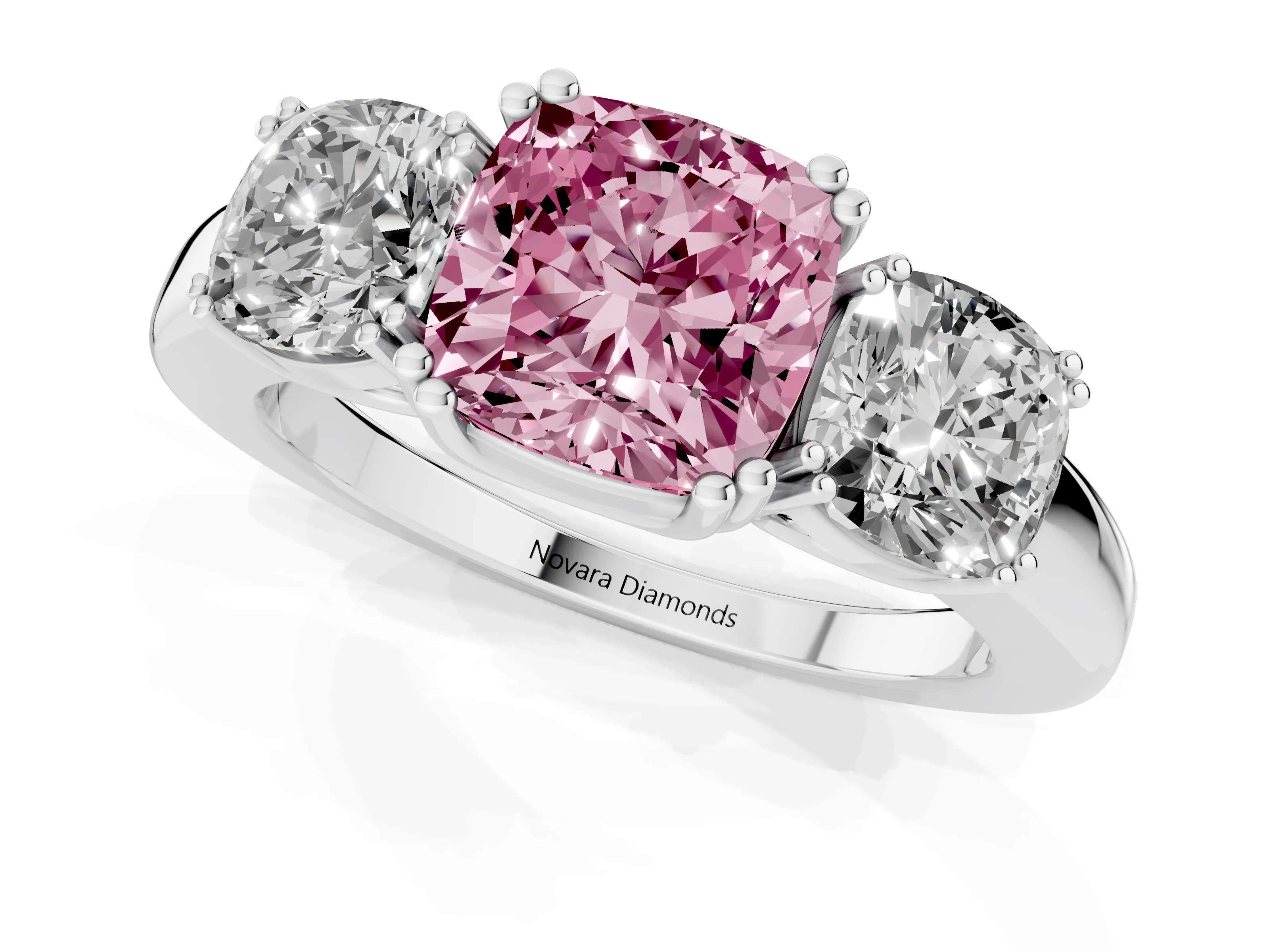 Fancy Pink Cushion Cut Diamond Three-Stone Ring Set in White gold with Polished Band and Prong Setting