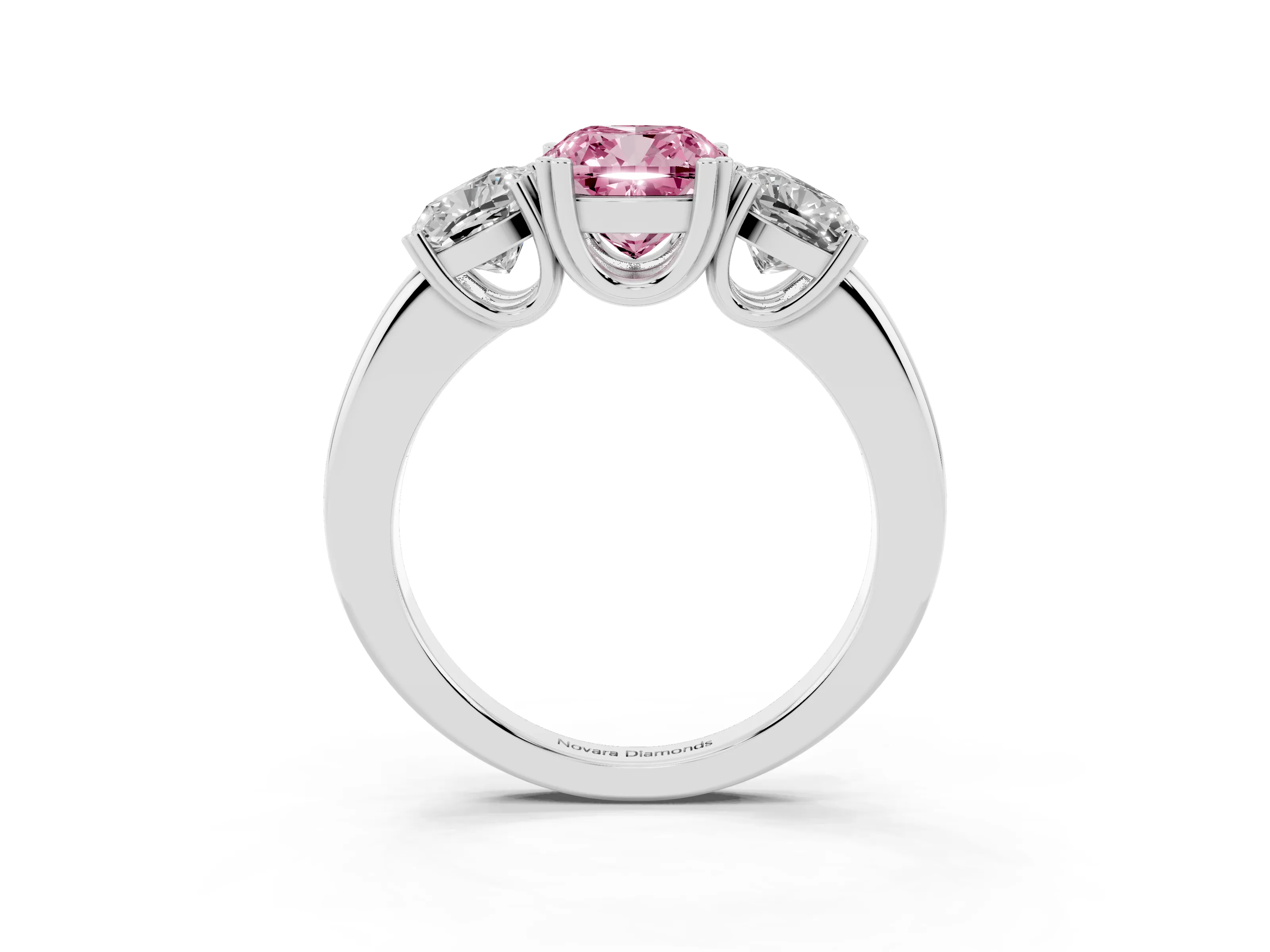 Fancy Pink Cushion Cut Diamond Three-Stone Ring Set in White gold with Polished Band and Prong Setting