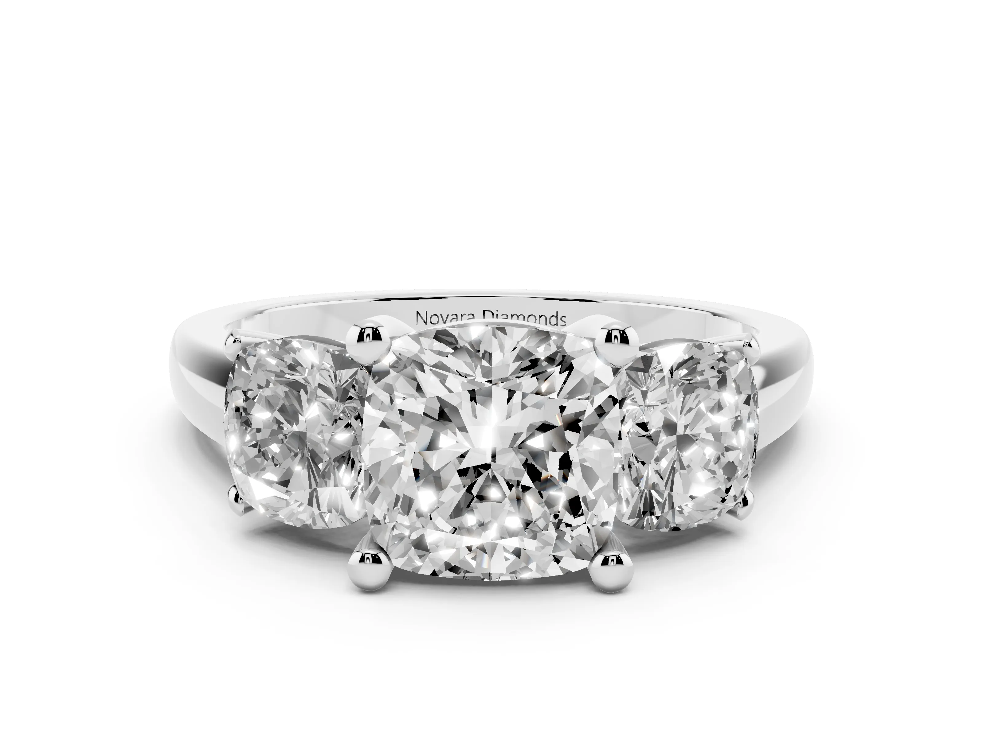 Cushion Cut Diamond Three-Stone Ring Set in White gold with Classic Prong Setting and Plain Band