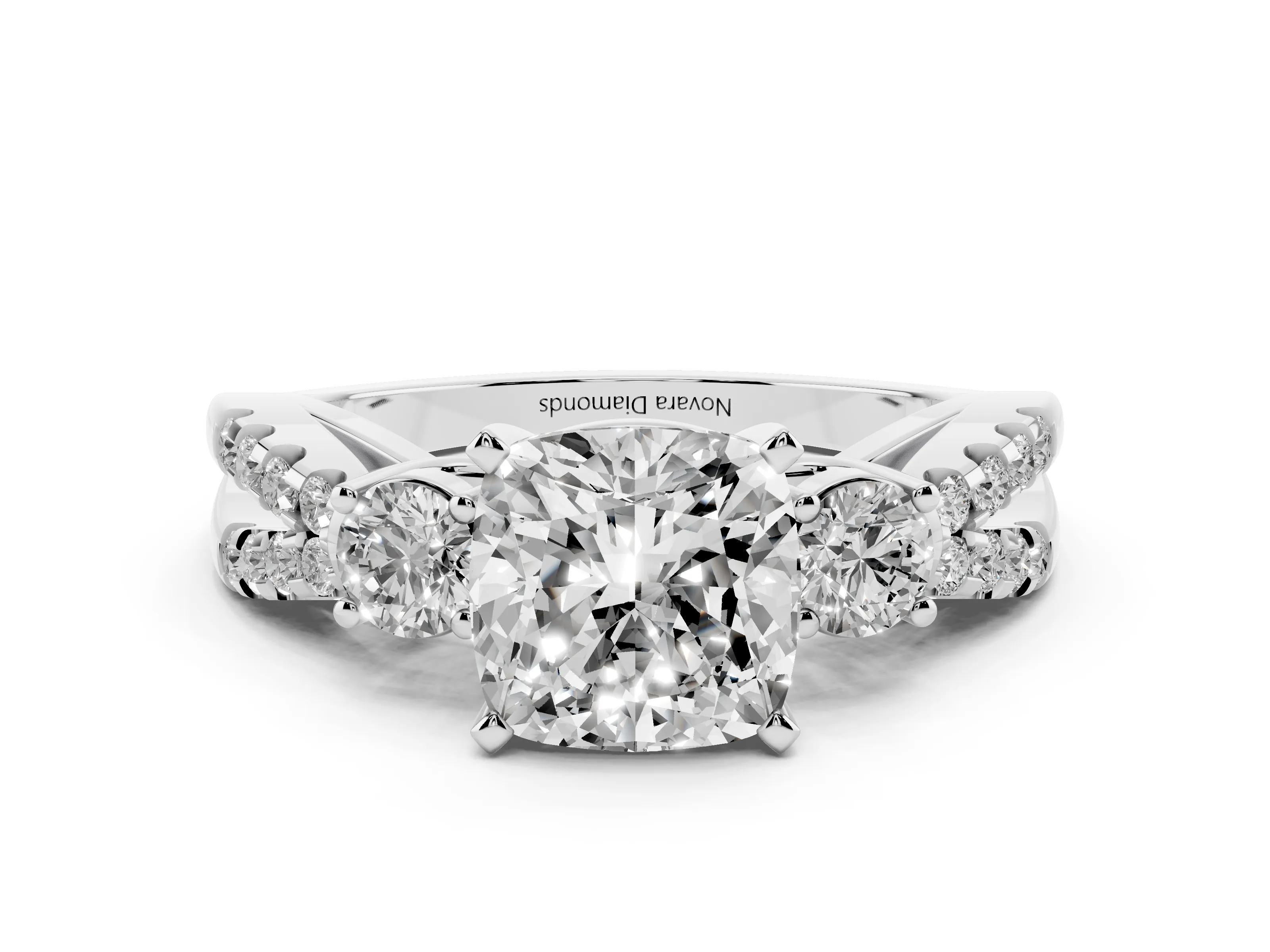 Cushion Cut Diamond Three-Stone Ring Set in Platinum with Pavé Split Shank and Prong Setting