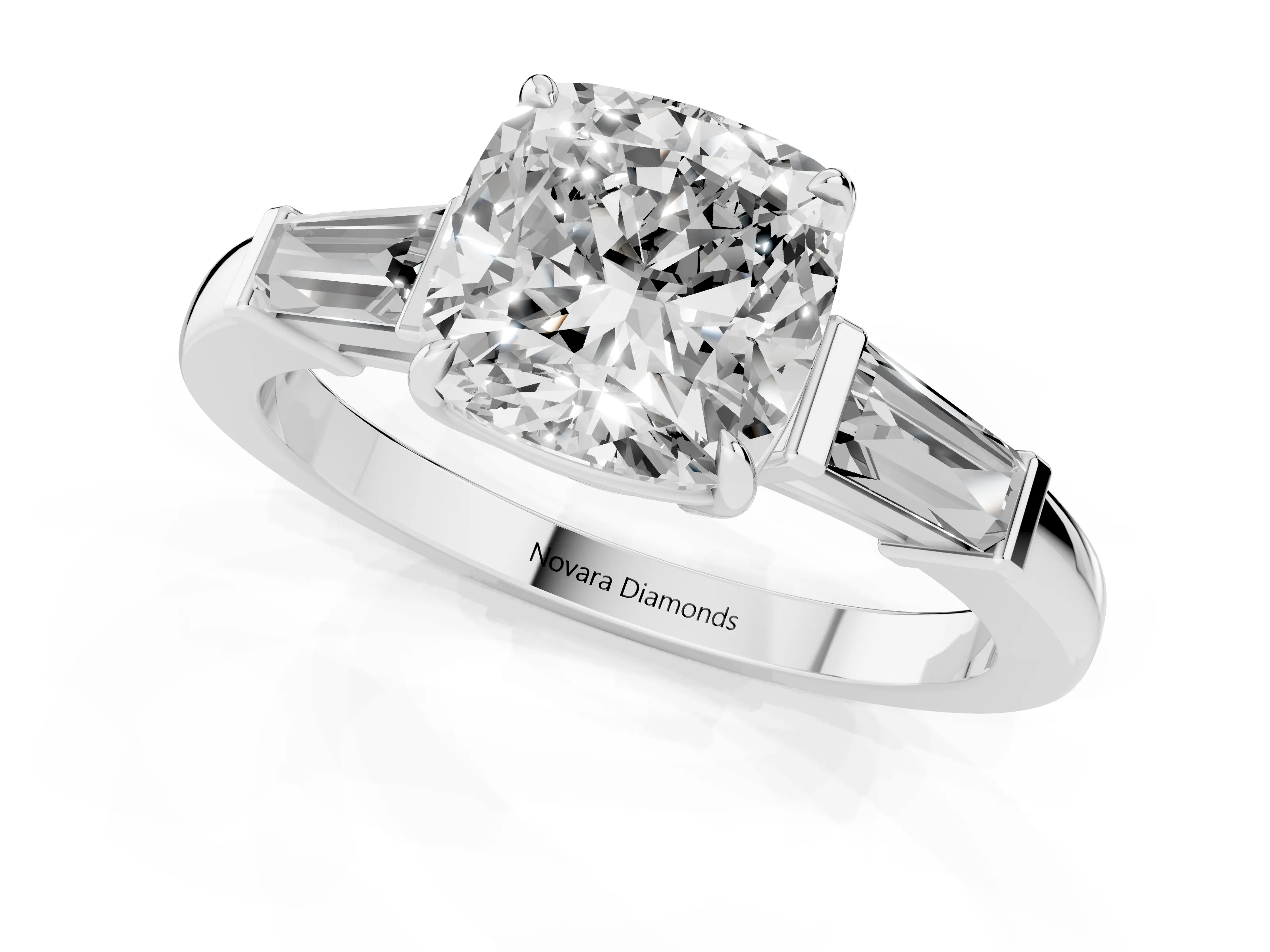 Cushion Cut Diamond Three-Stone Ring Set in Platinum with Tapered Baguette Side Stones and Prong Setting