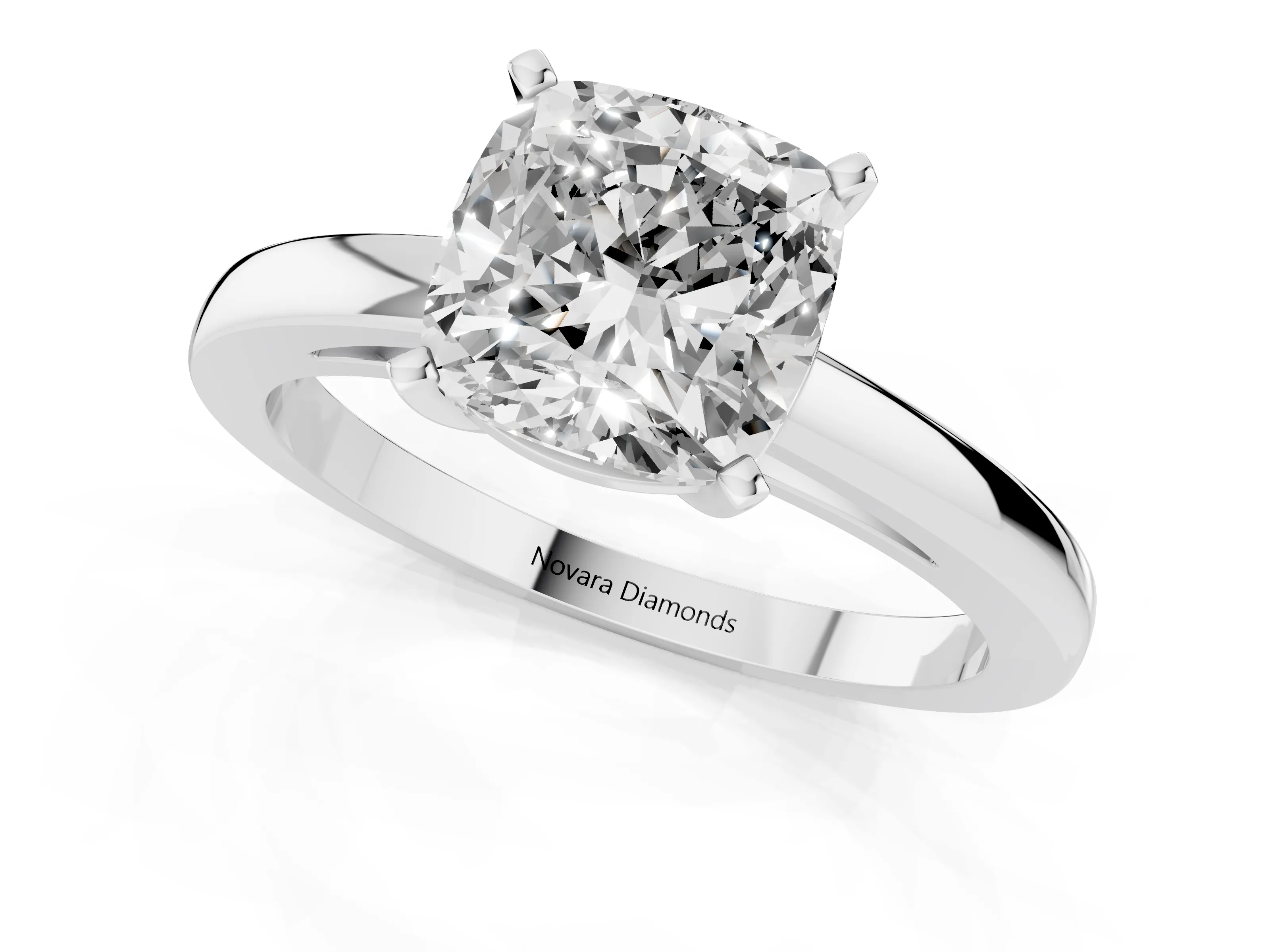 Cushion Cut Diamond Solitaire Engagement Ring Set in Platinum with Prong Setting on a Classic Band