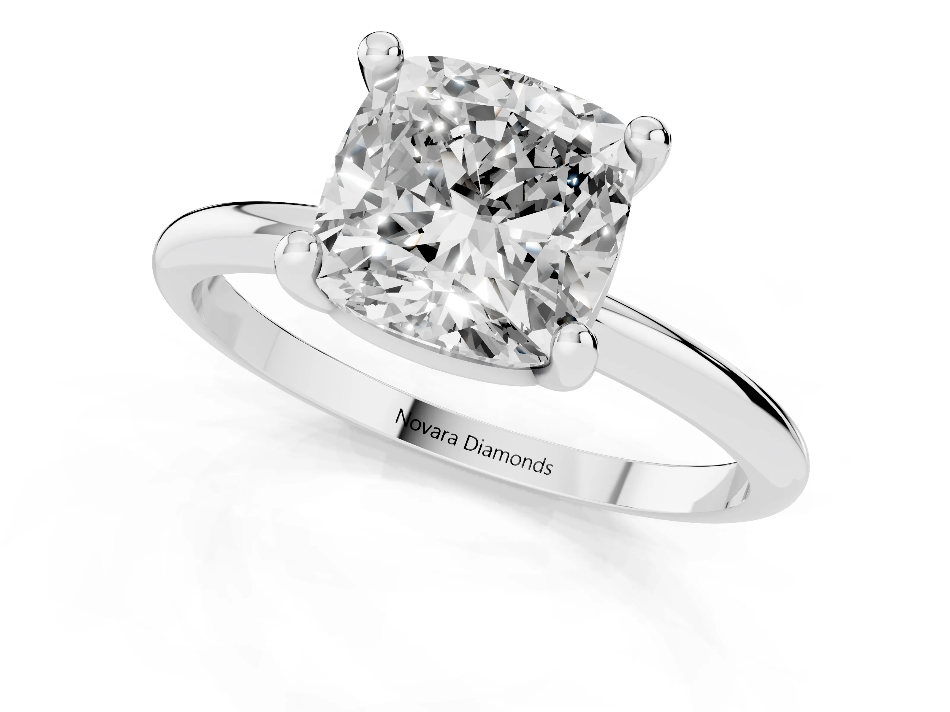 Cushion Cut Diamond Solitaire Ring Set in Silver with Secure Prong Setting on a Classic Band