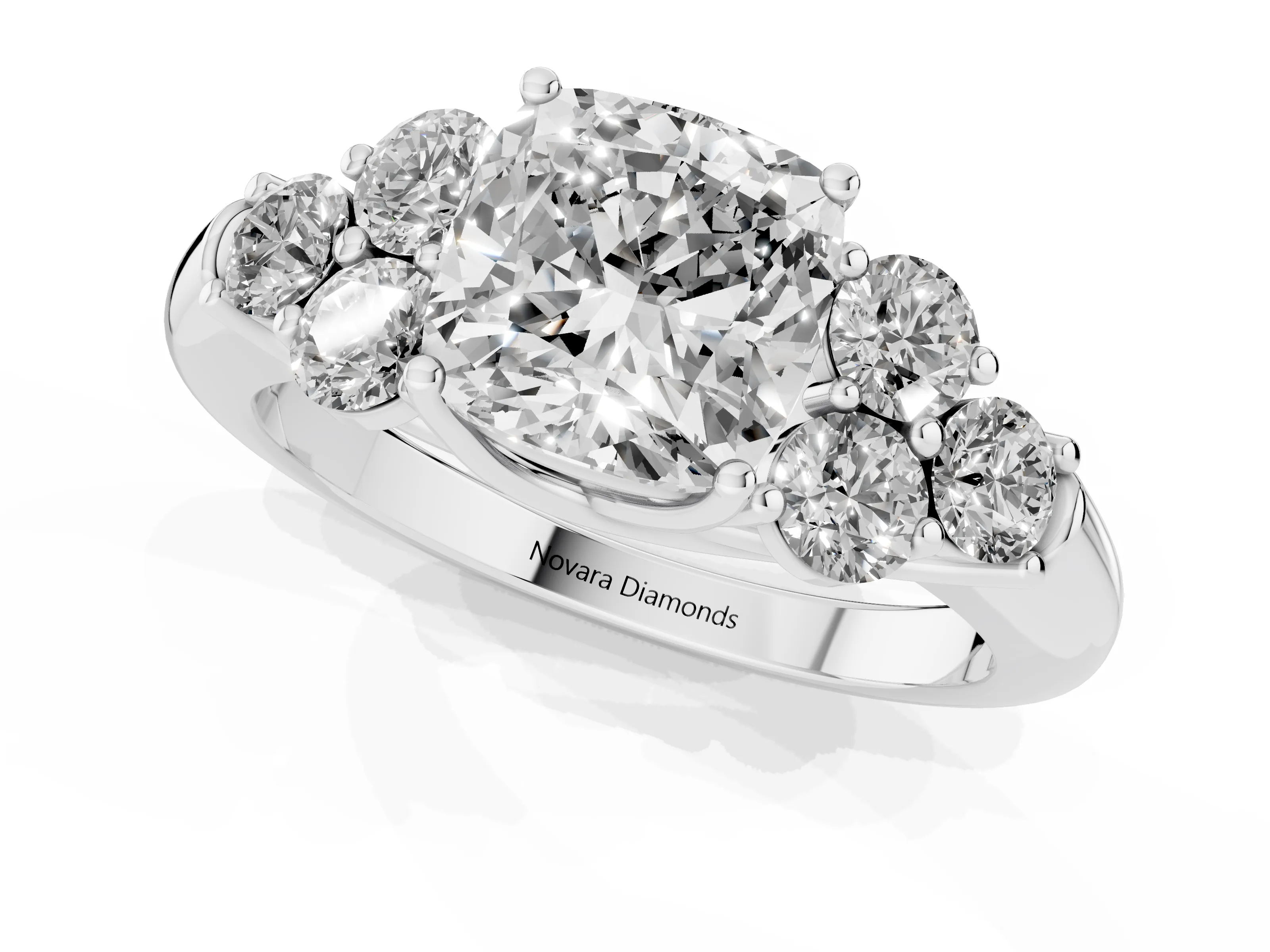 Cushion Cut Diamond Cluster Ring Set in White gold with Round Accent Stones and Prong Setting on a Plain Band