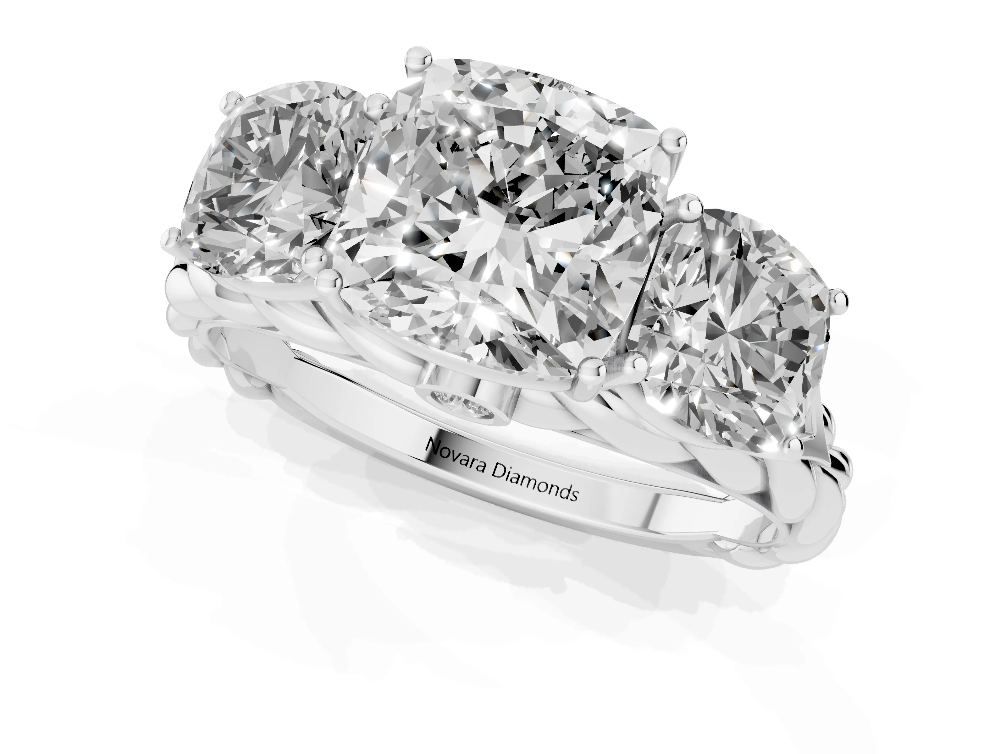 Cushion Cut Diamond Three-Stone Ring Set in Platinum with Braided Band