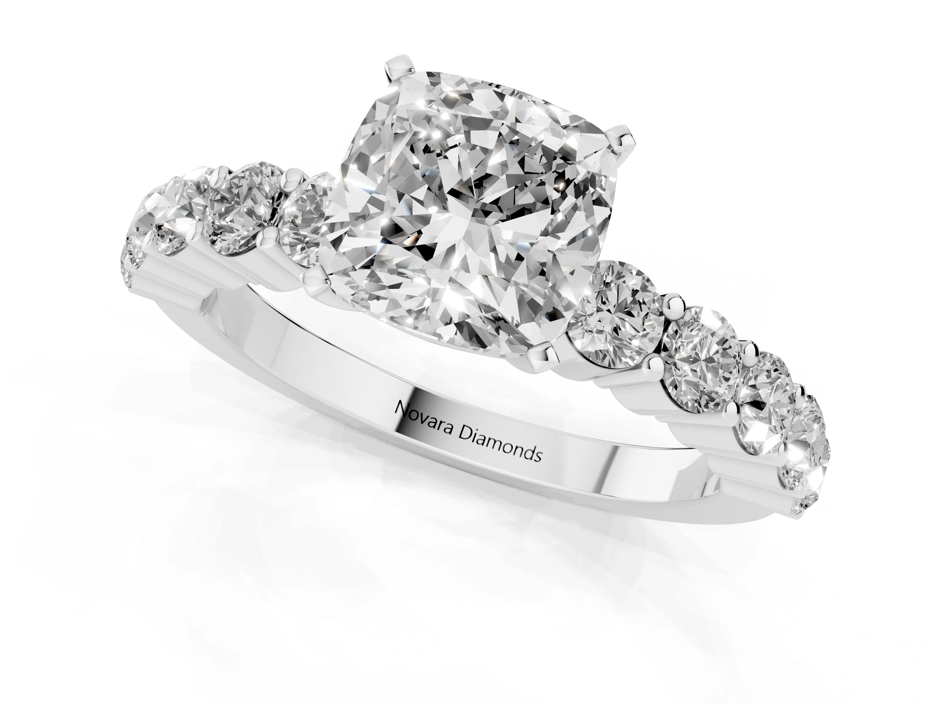 Cushion Cut Diamond Solitaire Ring Set in Platinum with Shared Prong Round Side Stones