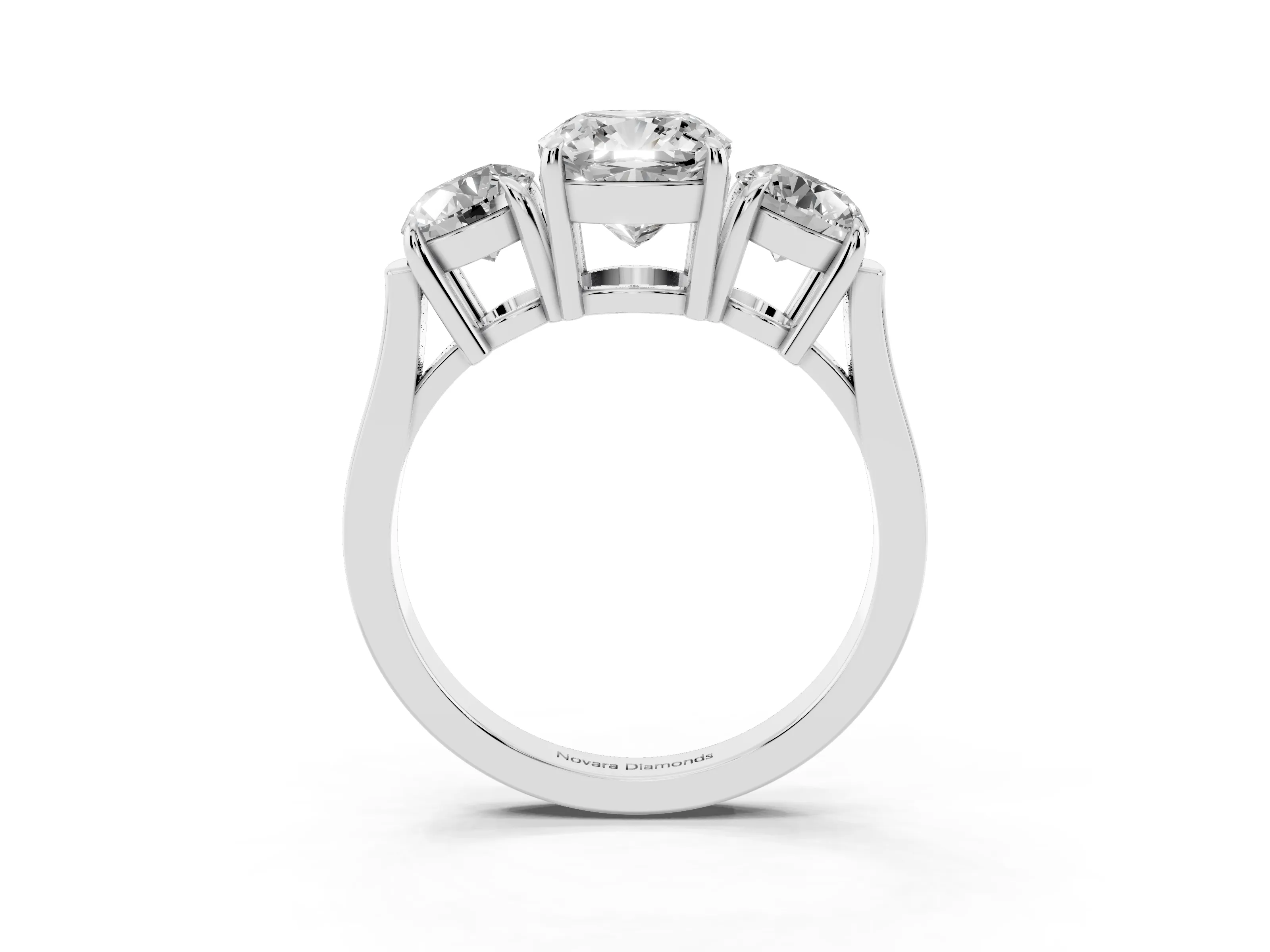 Cushion Cut Diamond Three-Stone Ring Set in Platinum with Round Accent Stones and Plain Band