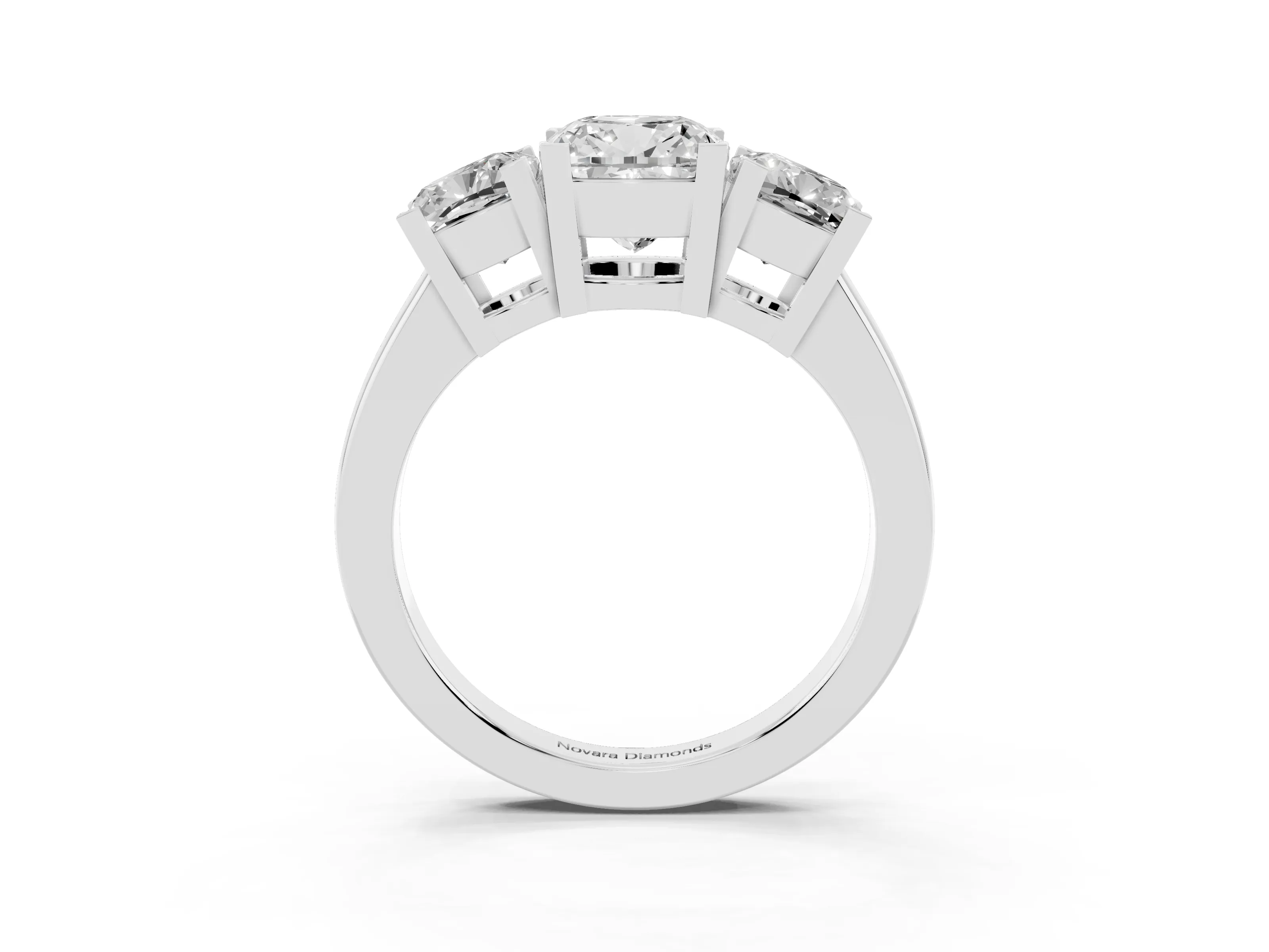 Cushion Cut Diamond Three-Stone Ring Set in Silver with Channel-Set Band and Prong Settings