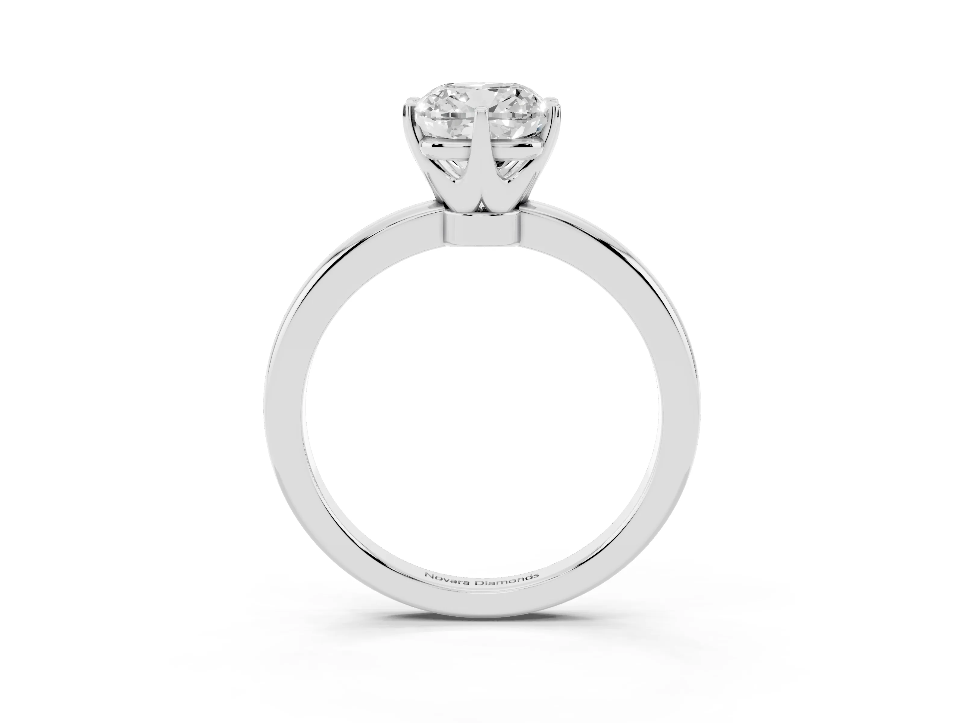 Cushion Cut Diamond Solitaire Ring Set in White gold with Raised Prong Setting on a Classic Band