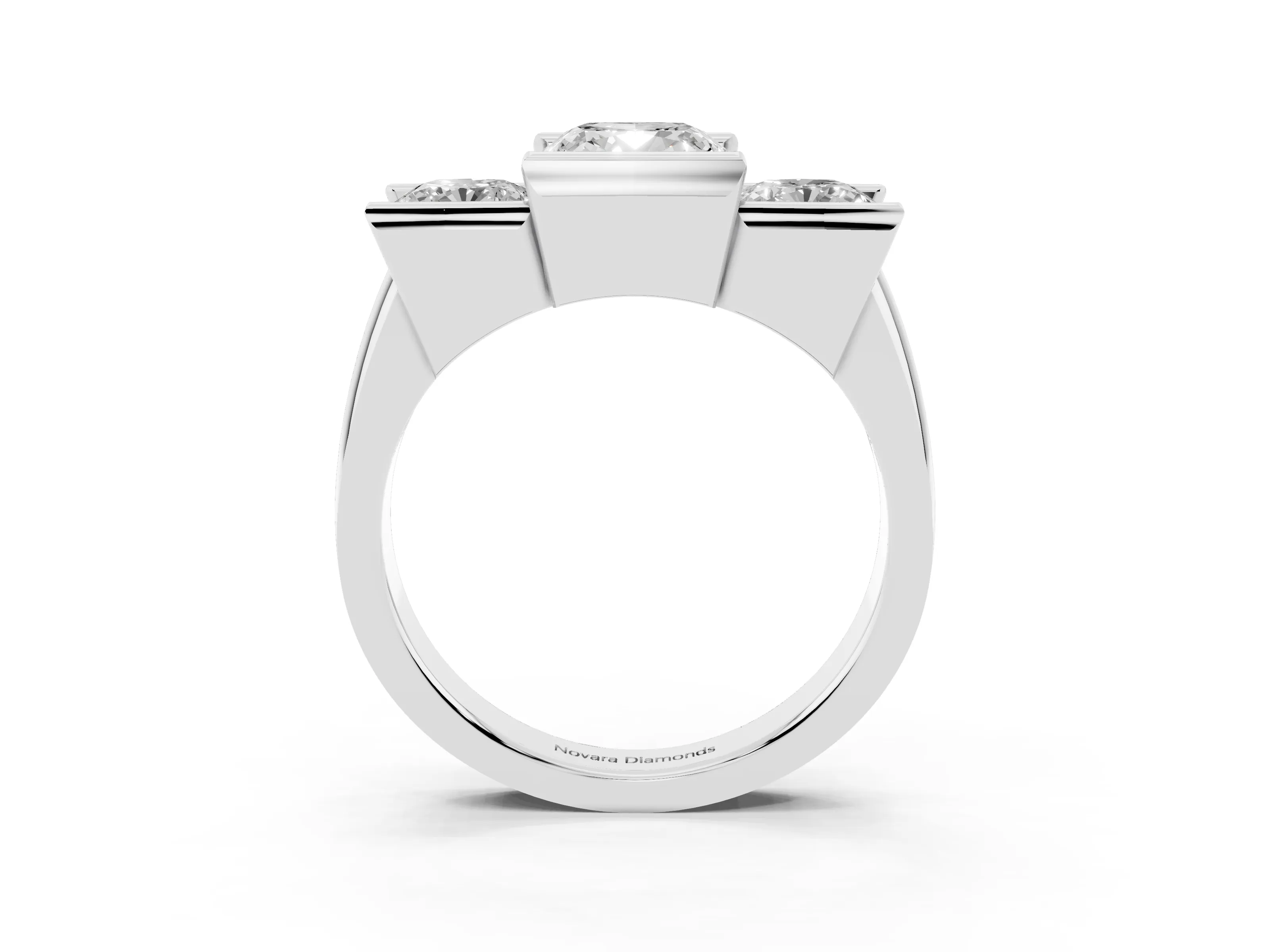 Cushion Cut Diamond Three-Stone Channel Set Ring Set in Platinum with Smooth Polished Band