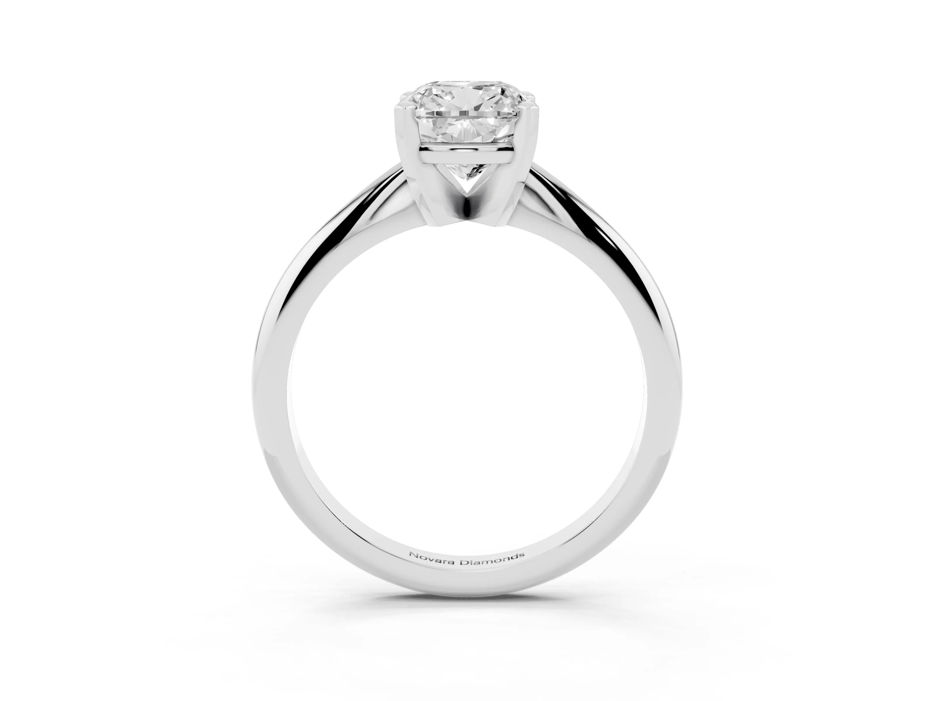 Cushion Cut Diamond Solitaire Ring Set in Platinum with Prong Setting on a Plain Round Band