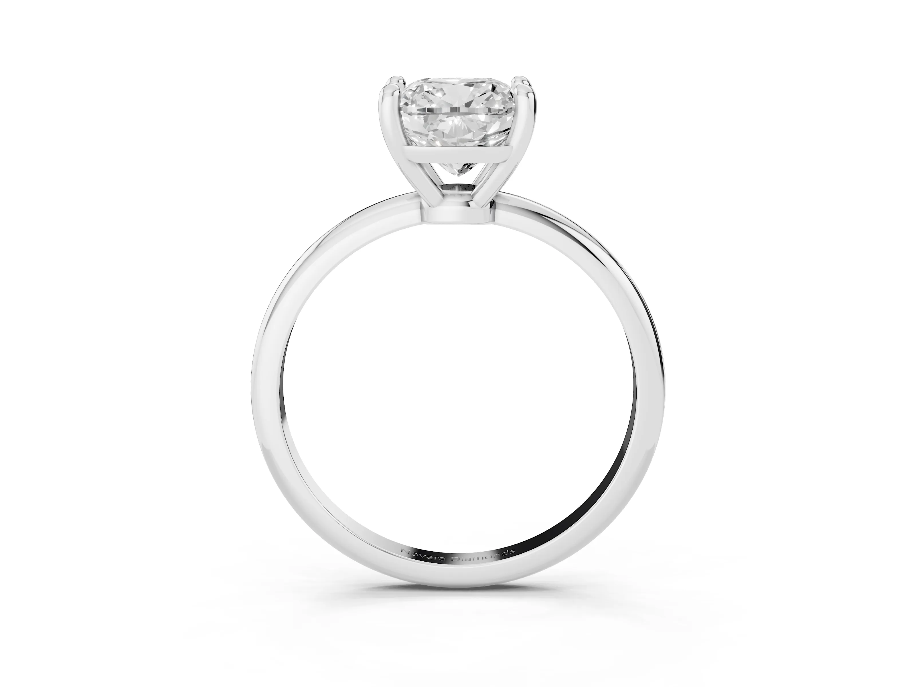 Cushion Cut Diamond Solitaire Ring Set in Silver with Secure Prong Setting on a Classic Band