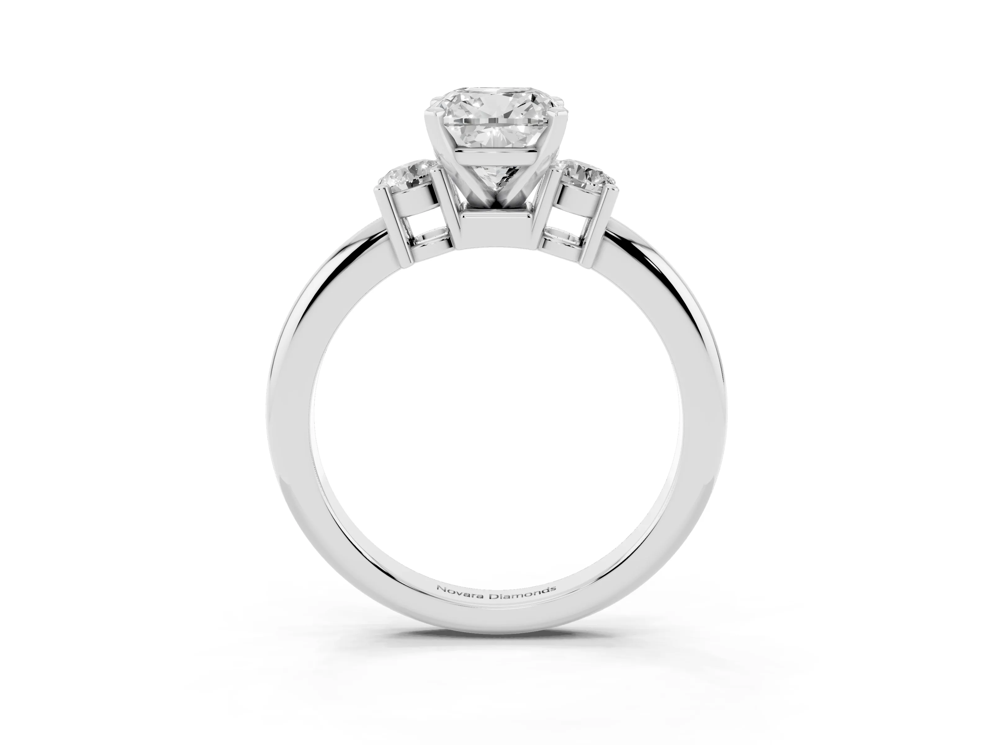 Three-Stone Cushion Cut Diamond Ring Set in Platinum with Prong Setting and Plain Band