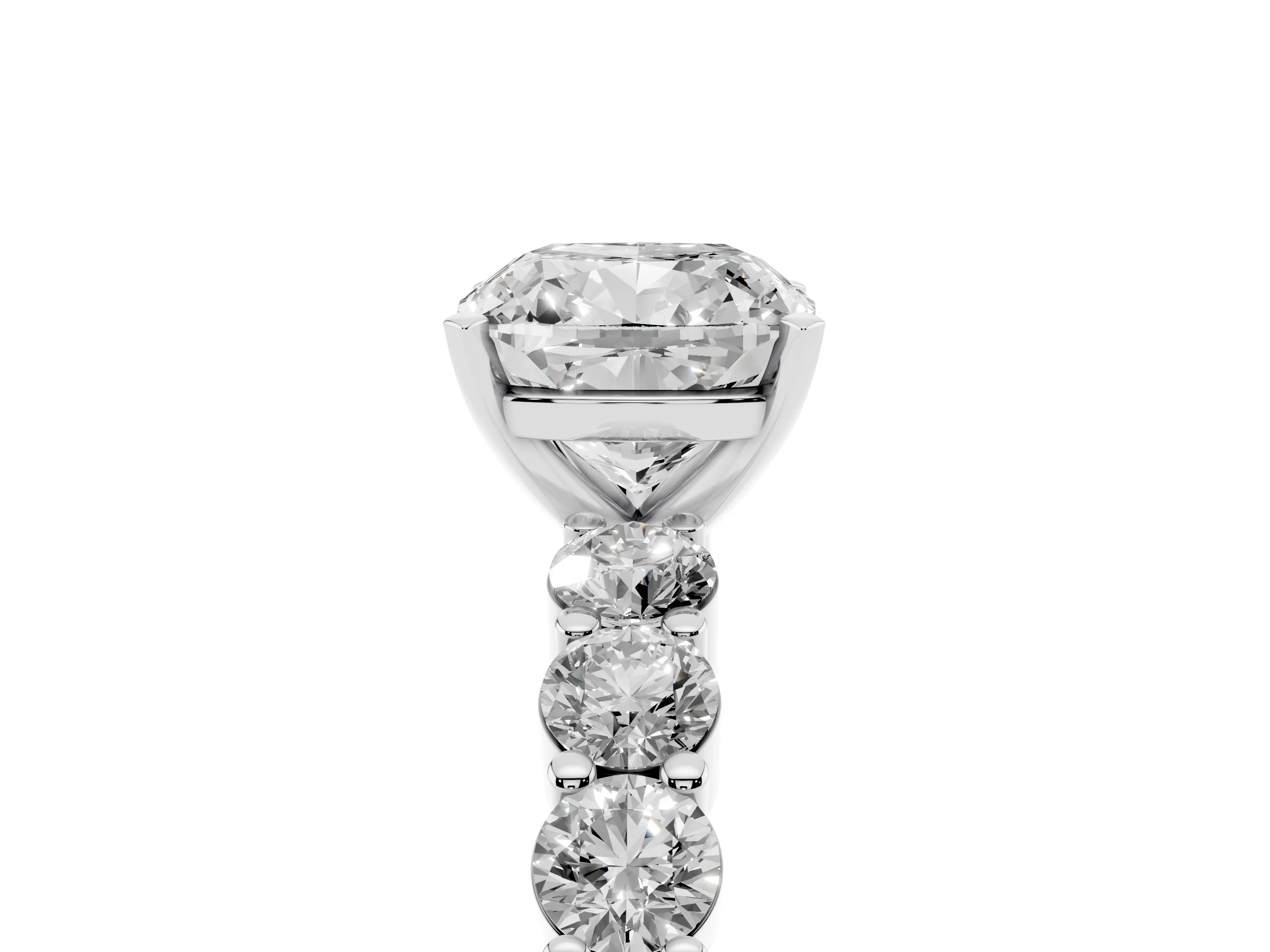 Cushion Cut Diamond Solitaire Ring Set in Platinum with Shared Prong Round Side Stones
