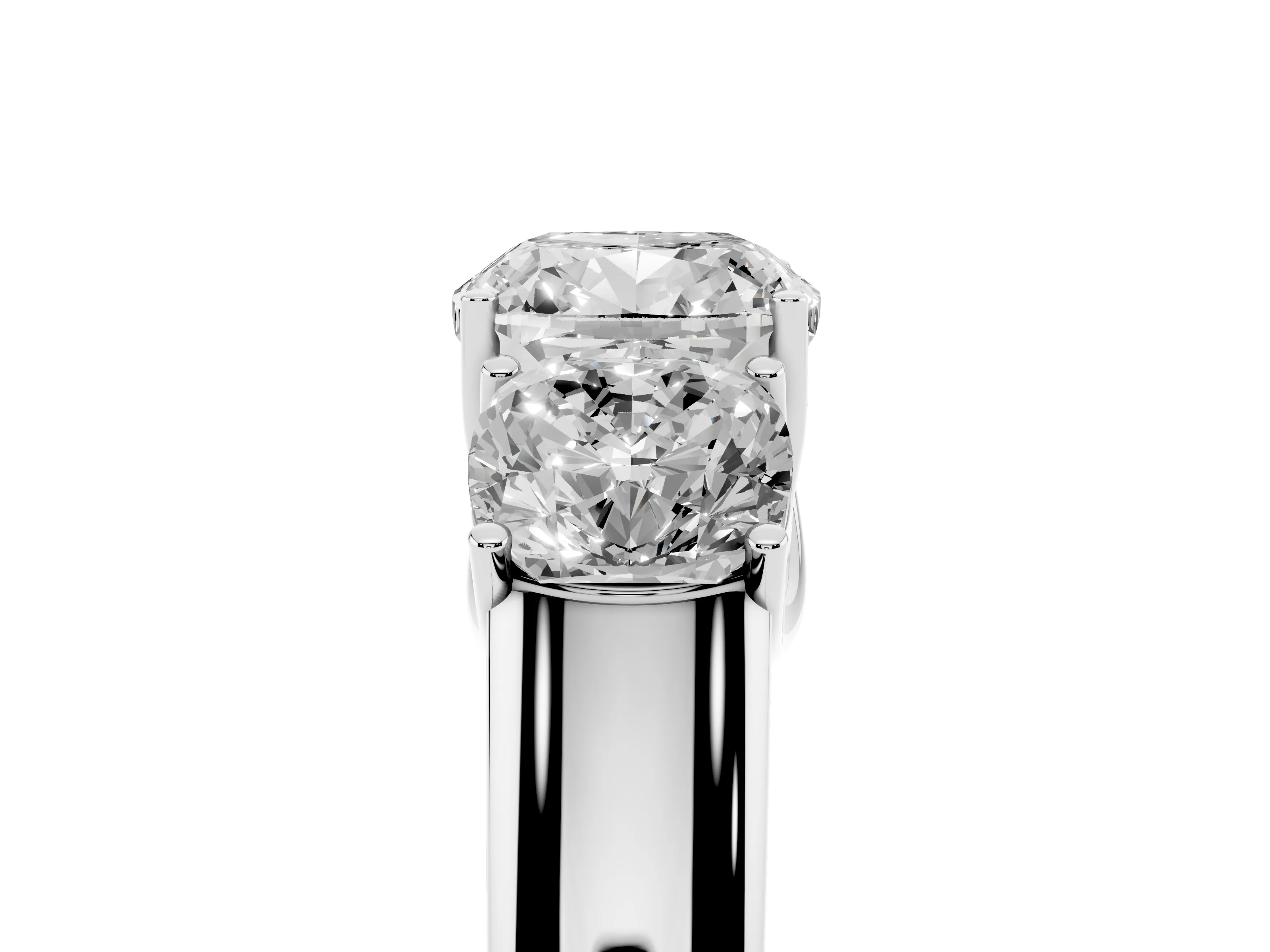 Three-Stone Cushion Cut Diamond Ring Set in Platinum with Matching Prong Settings and Plain Band