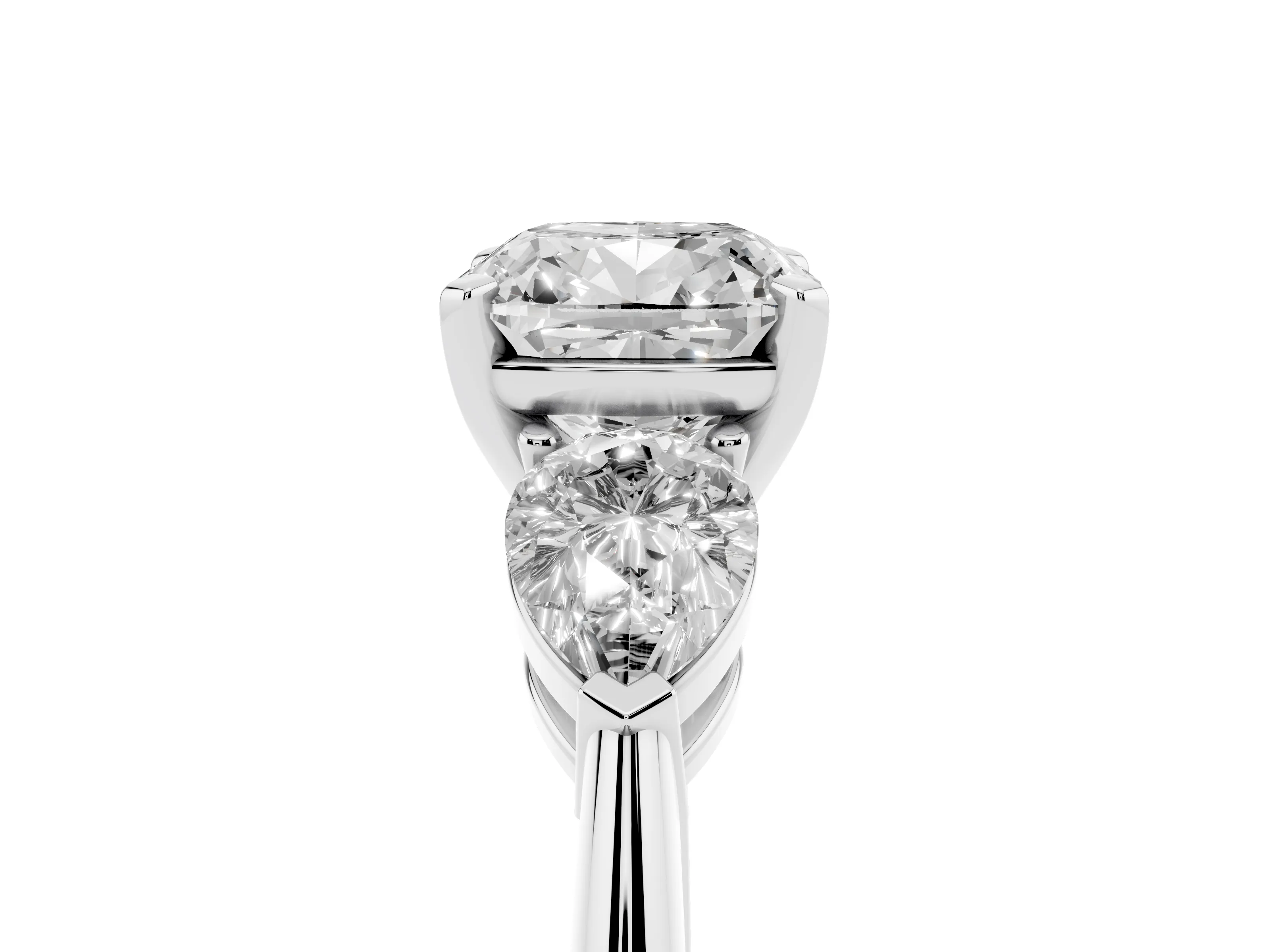 Three-Stone Cushion Cut Diamond Ring Set in Silver with Pear Side Stones and Prong Setting
