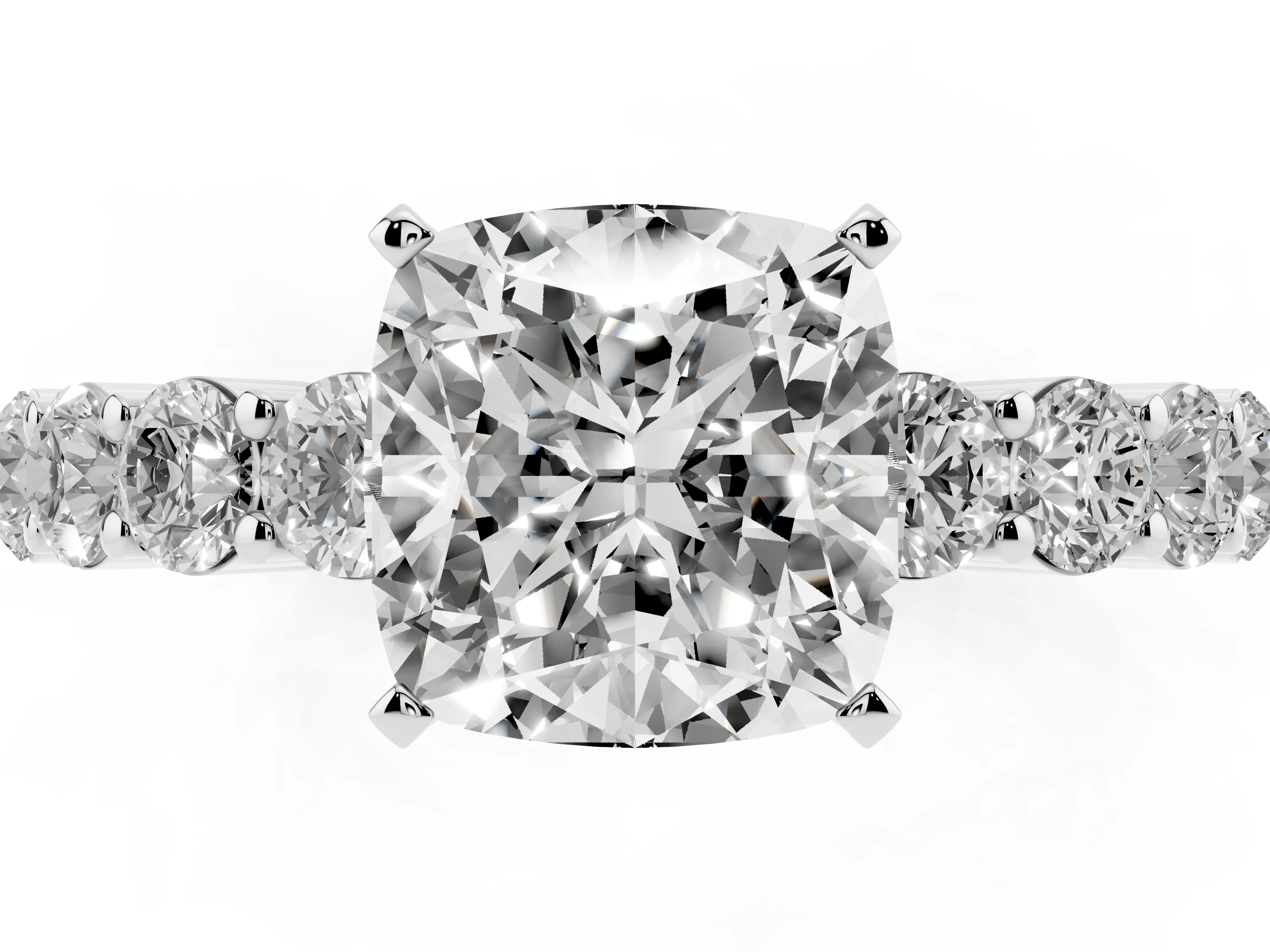 Cushion Cut Diamond Solitaire Ring Set in Platinum with Shared Prong Round Side Stones