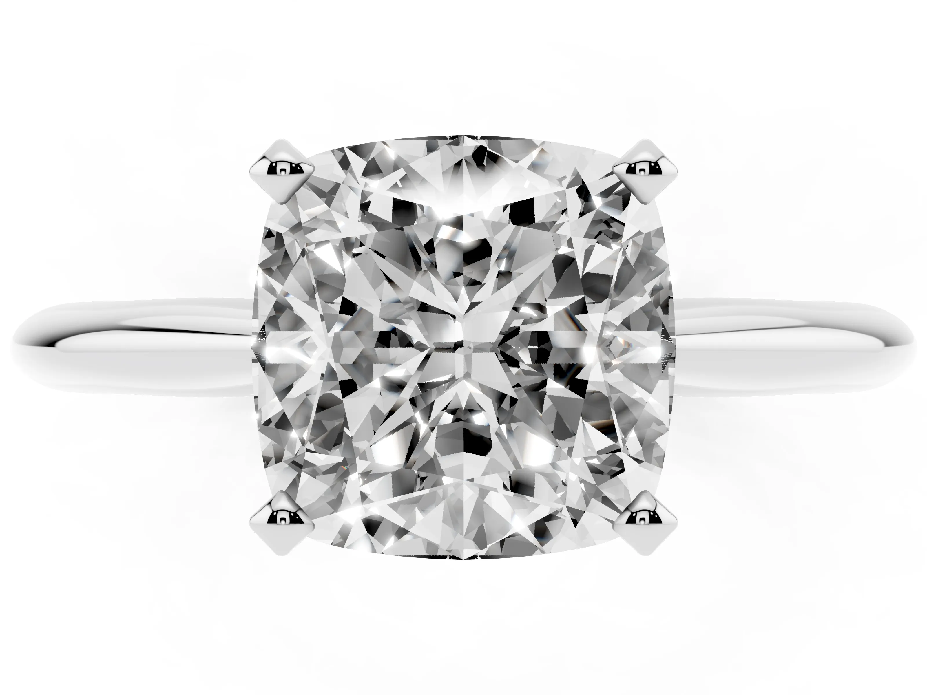 Cushion Cut Diamond Solitaire Ring Set in Platinum with Prong Setting on a Plain Round Band