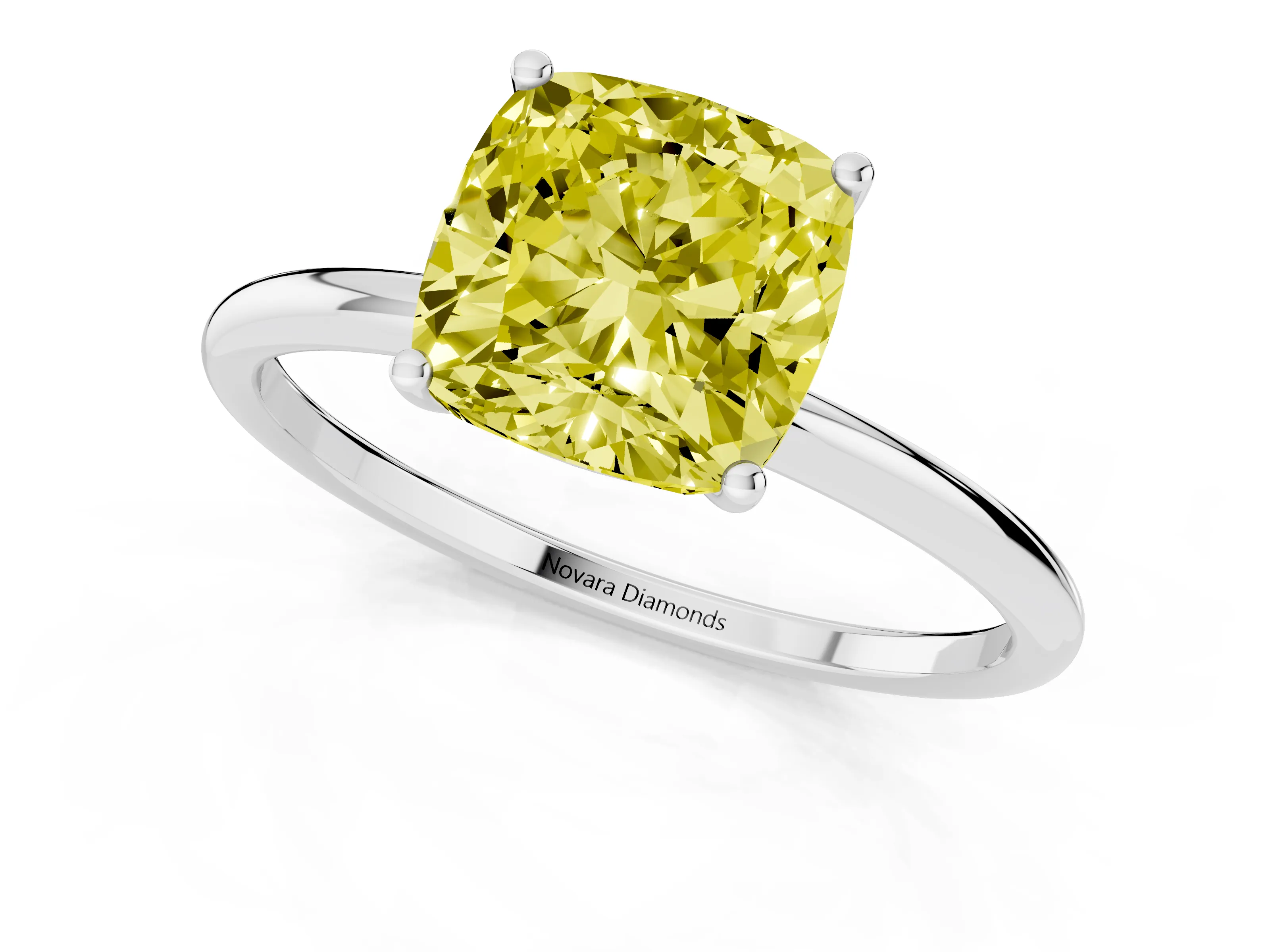 Fancy Yellow Cushion Cut Diamond Solitaire Engagement Ring Set in White gold with Thin Band and Prong Setting