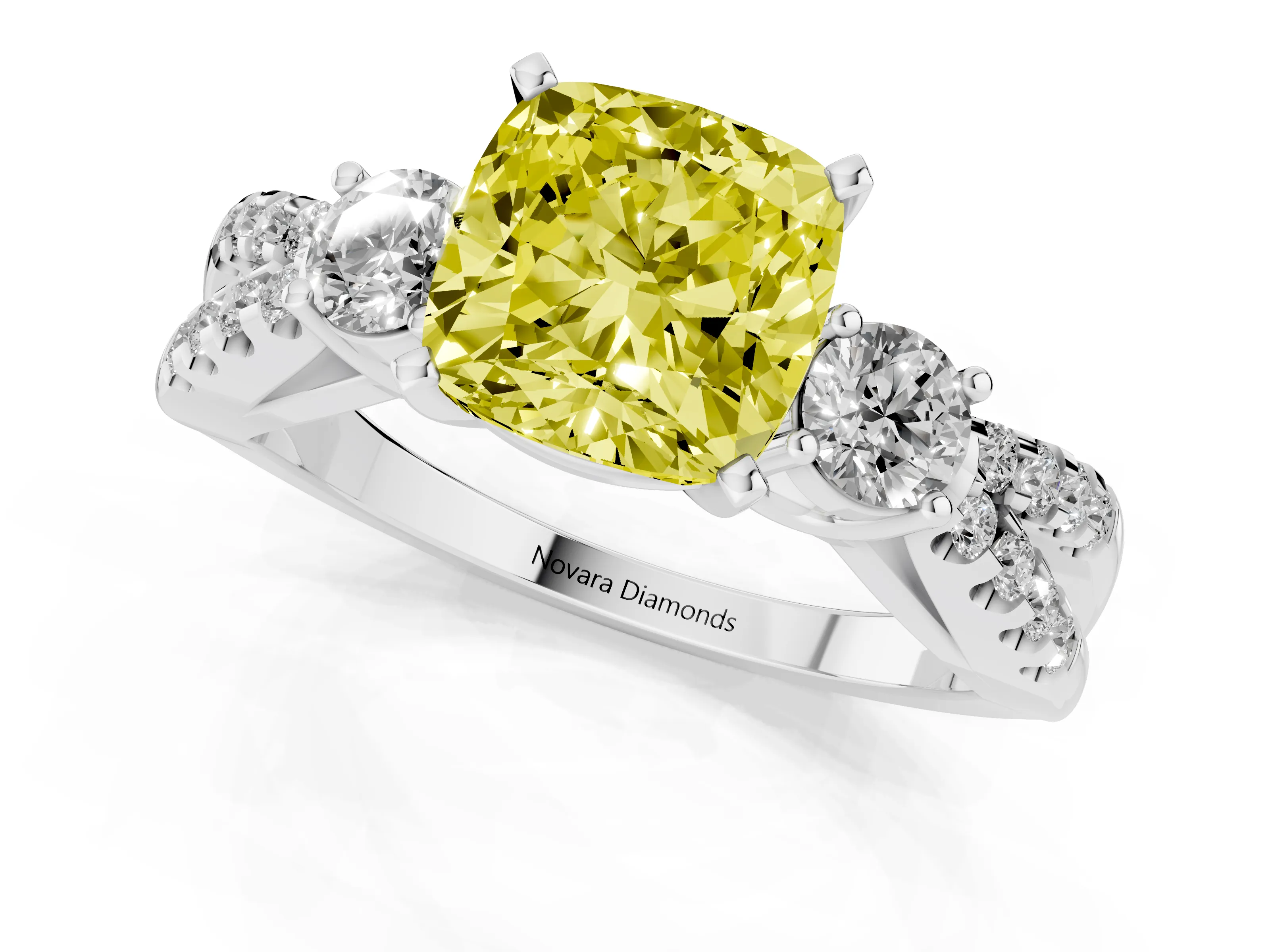 Fancy Yellow Cushion Cut Diamond Three-Stone Ring Set in White gold with Pavé Split Shank and Prong Setting