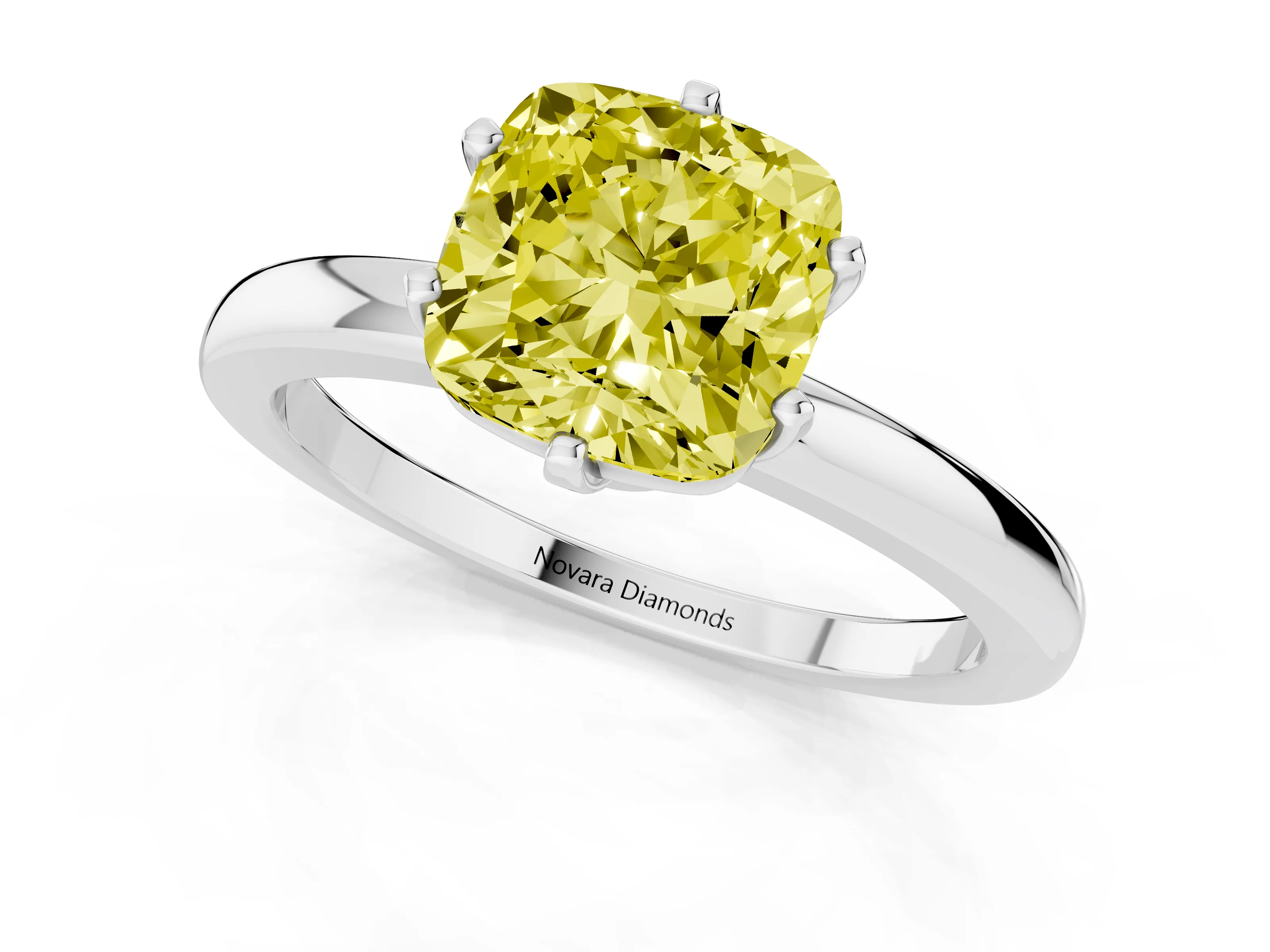 Fancy Yellow Cushion Cut Diamond Solitaire Ring Set in Platinum with Raised Prong Setting on a Classic Band