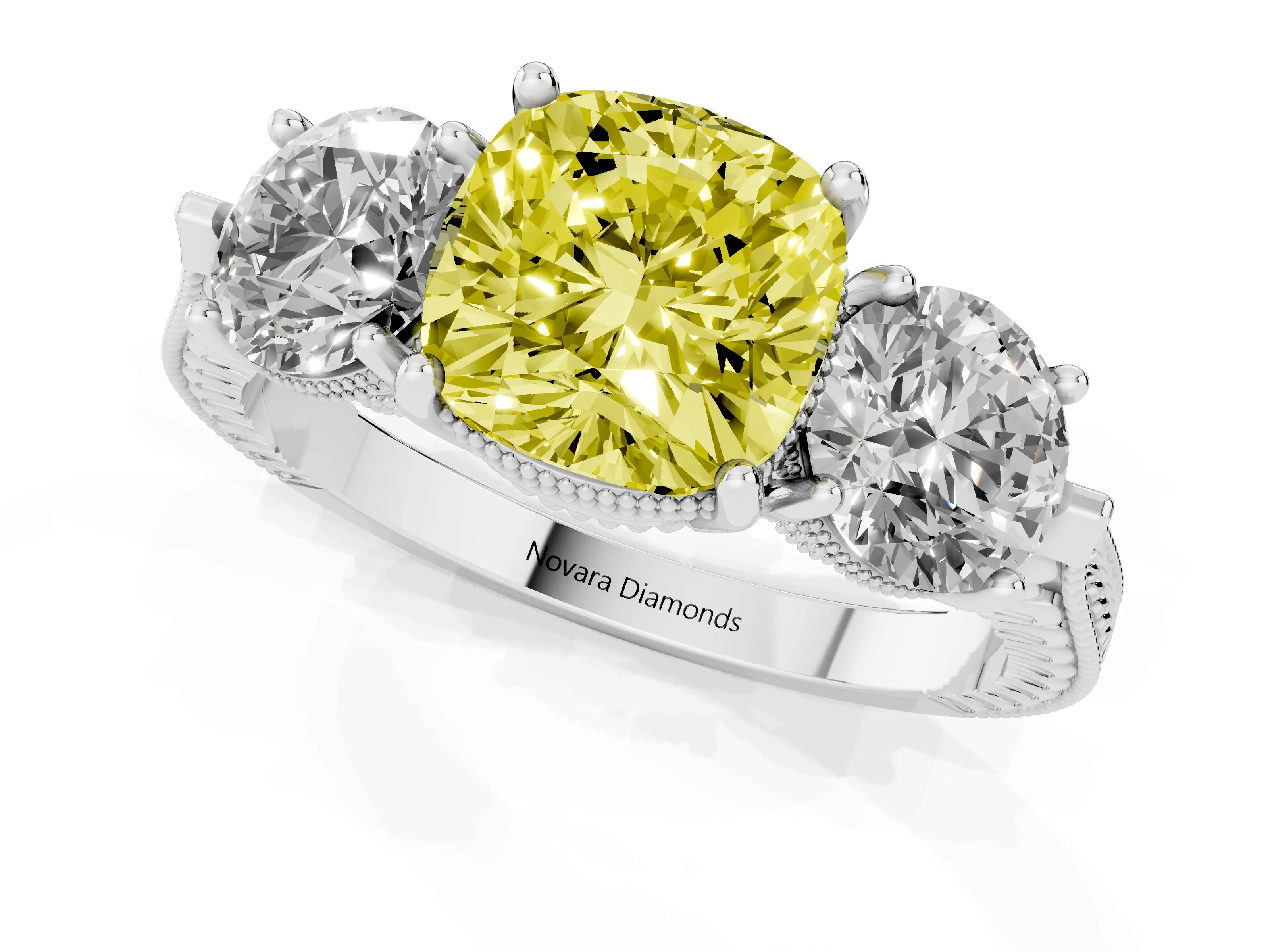 Fancy Yellow Cushion Cut Diamond Three-Stone Ring Set in Platinum with Milgrain Band