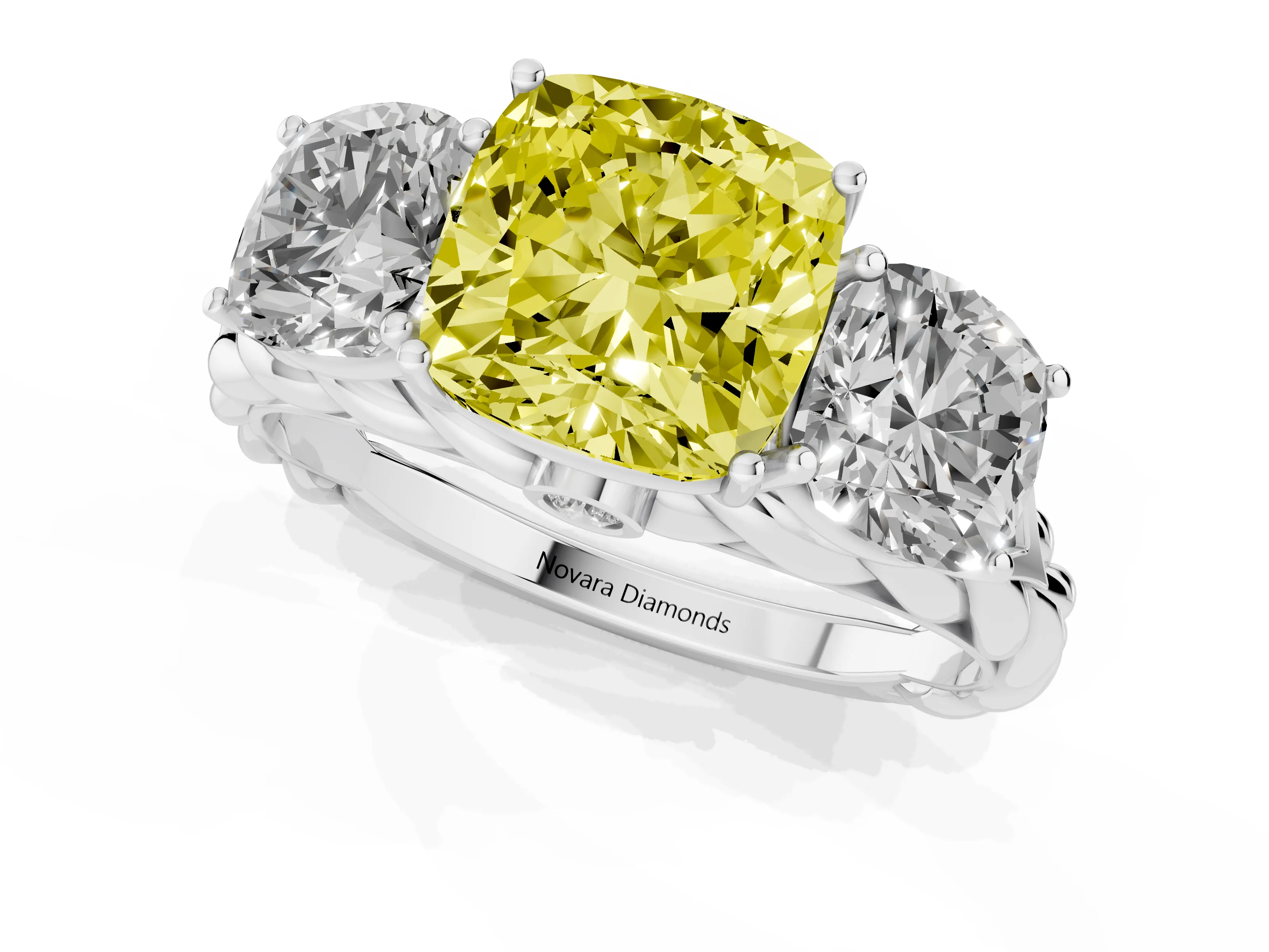 Fancy Yellow Cushion Cut Diamond Three-Stone Ring Set in Platinum with Braided Band