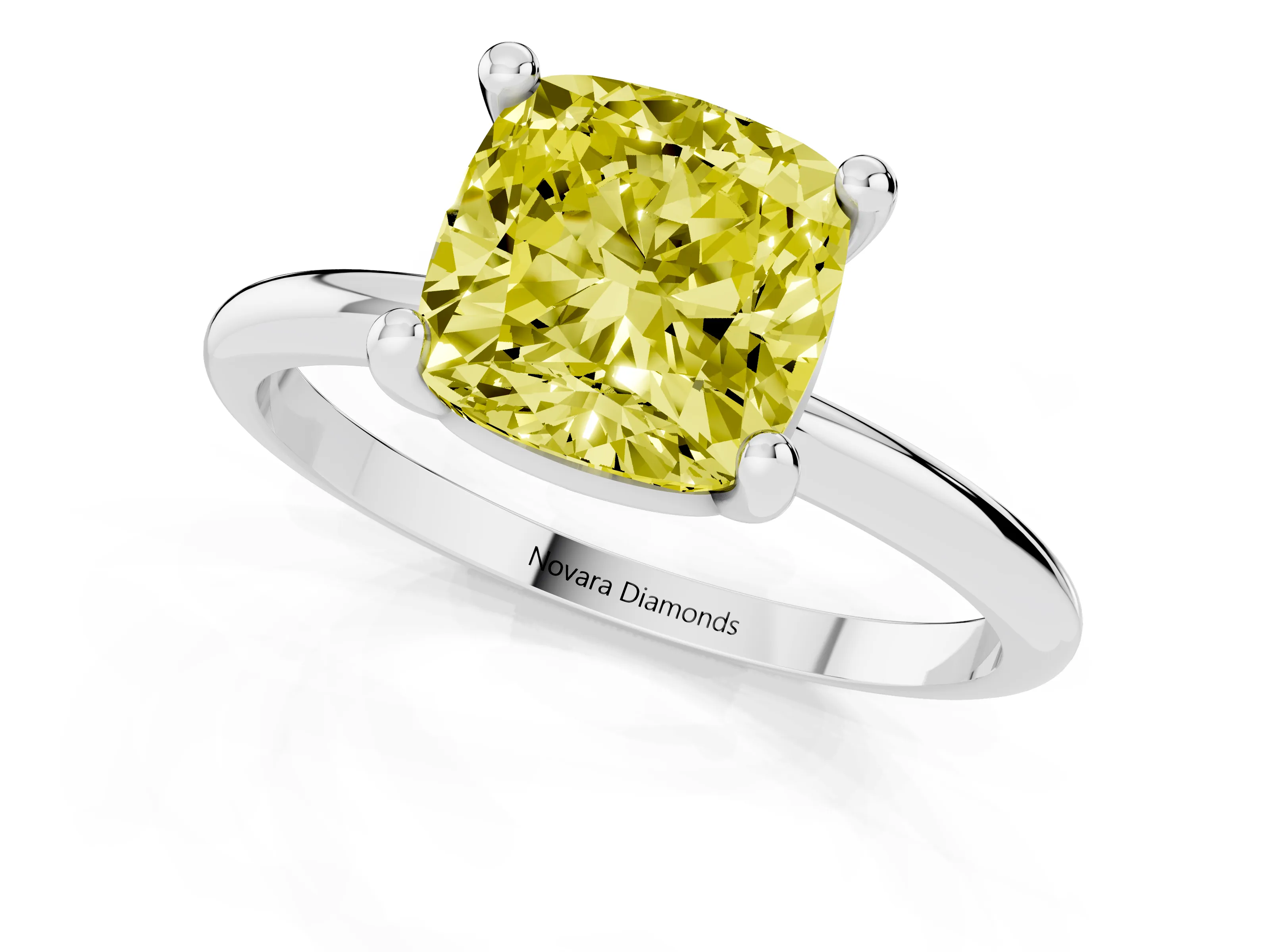 Fancy Yellow Cushion Cut Diamond Solitaire Ring Set in Platinum with Secure Prong Setting on a Classic Band