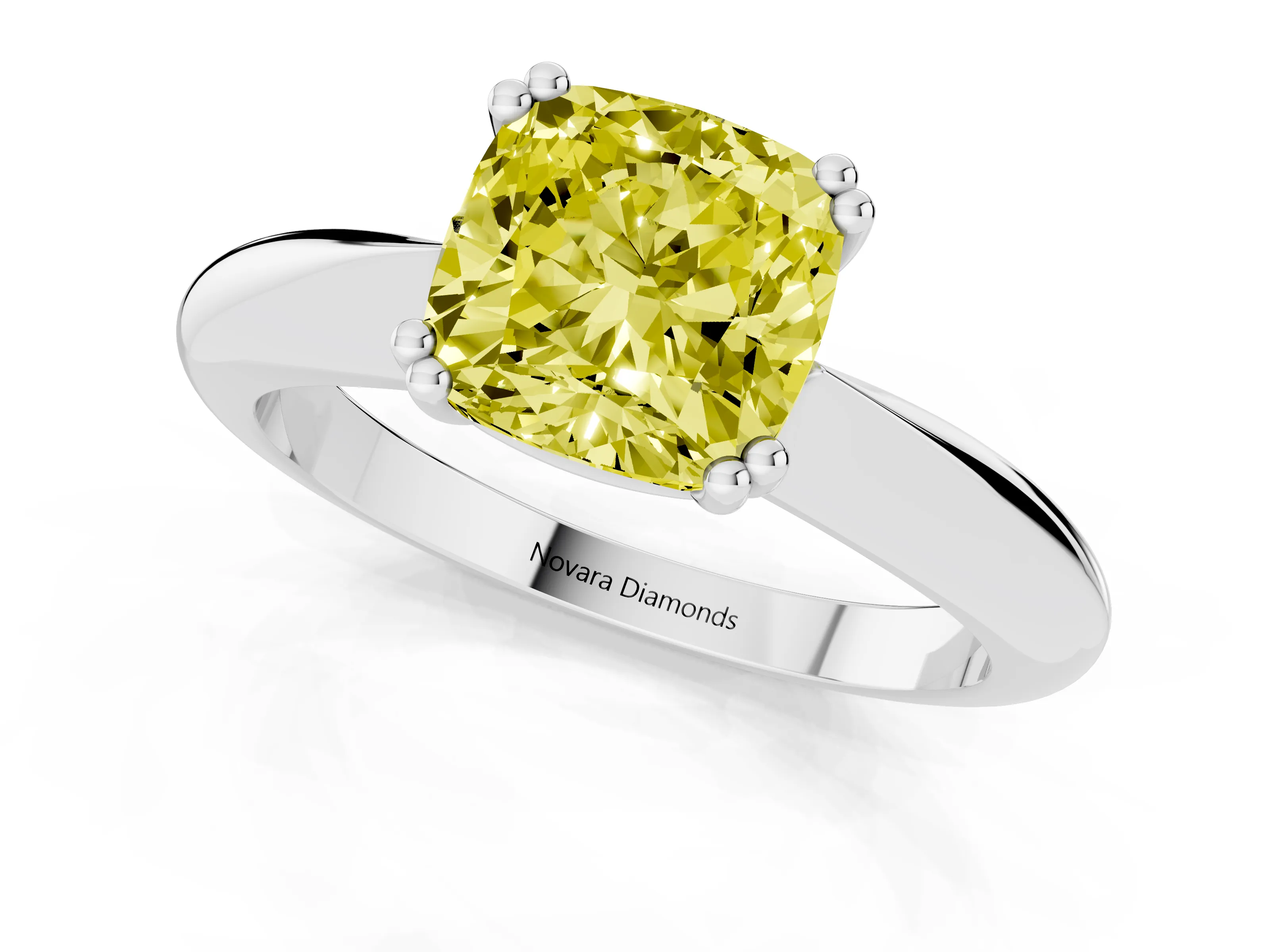 Fancy Yellow Cushion Cut Diamond Solitaire Engagement Ring Set in White gold with Tapered Band and Prong Setting