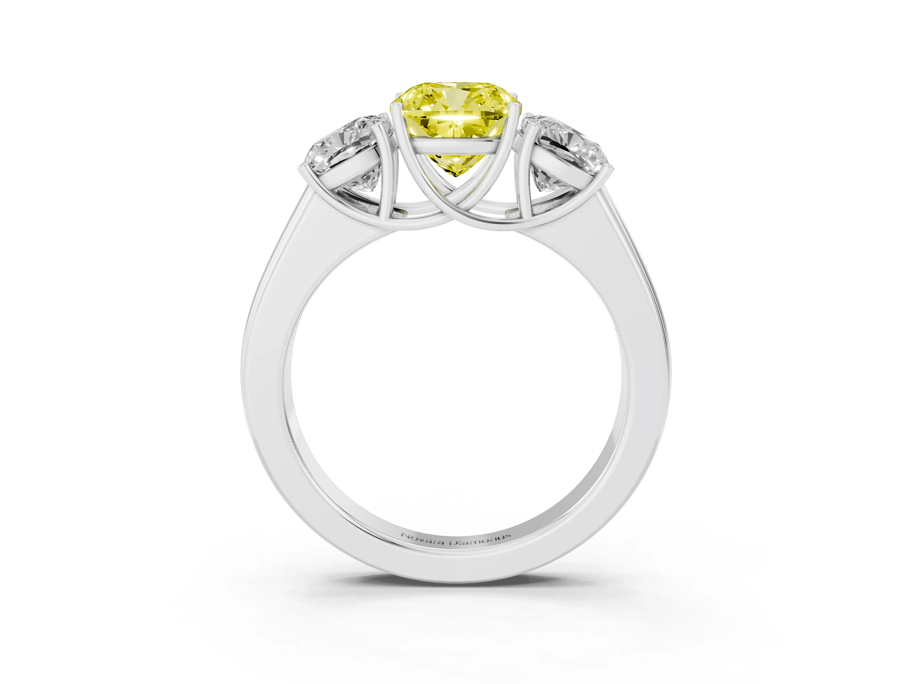 Fancy Yellow Three-Stone Cushion Cut Diamond Ring Set in Silver with Matching Prong Settings and Plain Band