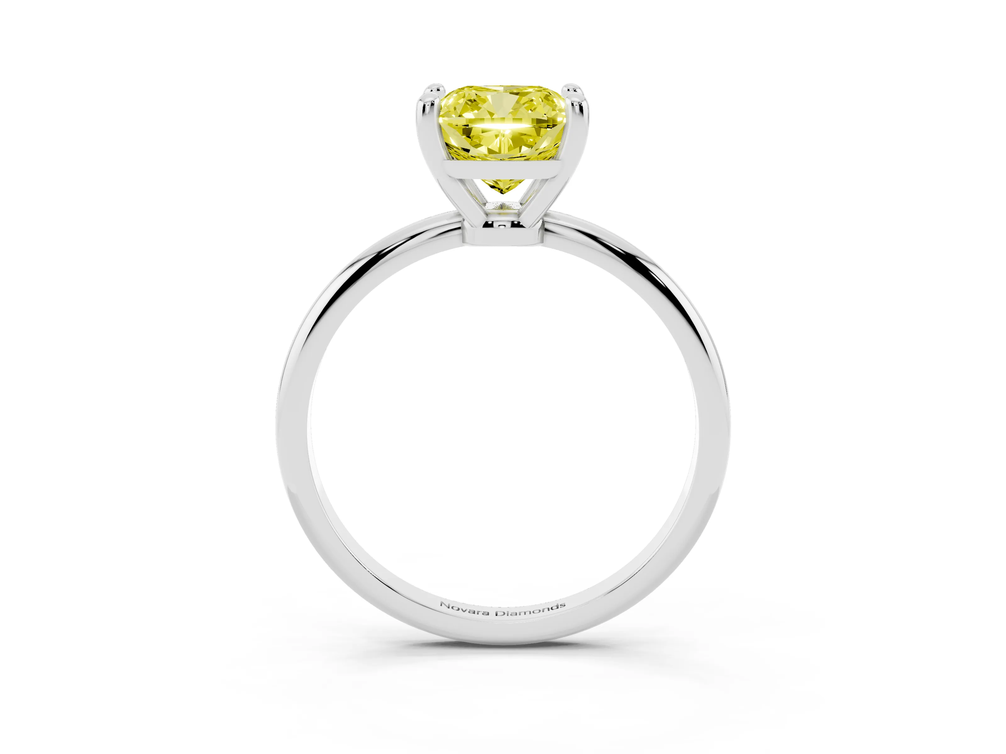 Fancy Yellow Cushion Cut Diamond Solitaire Ring Set in Platinum with Secure Prong Setting on a Classic Band