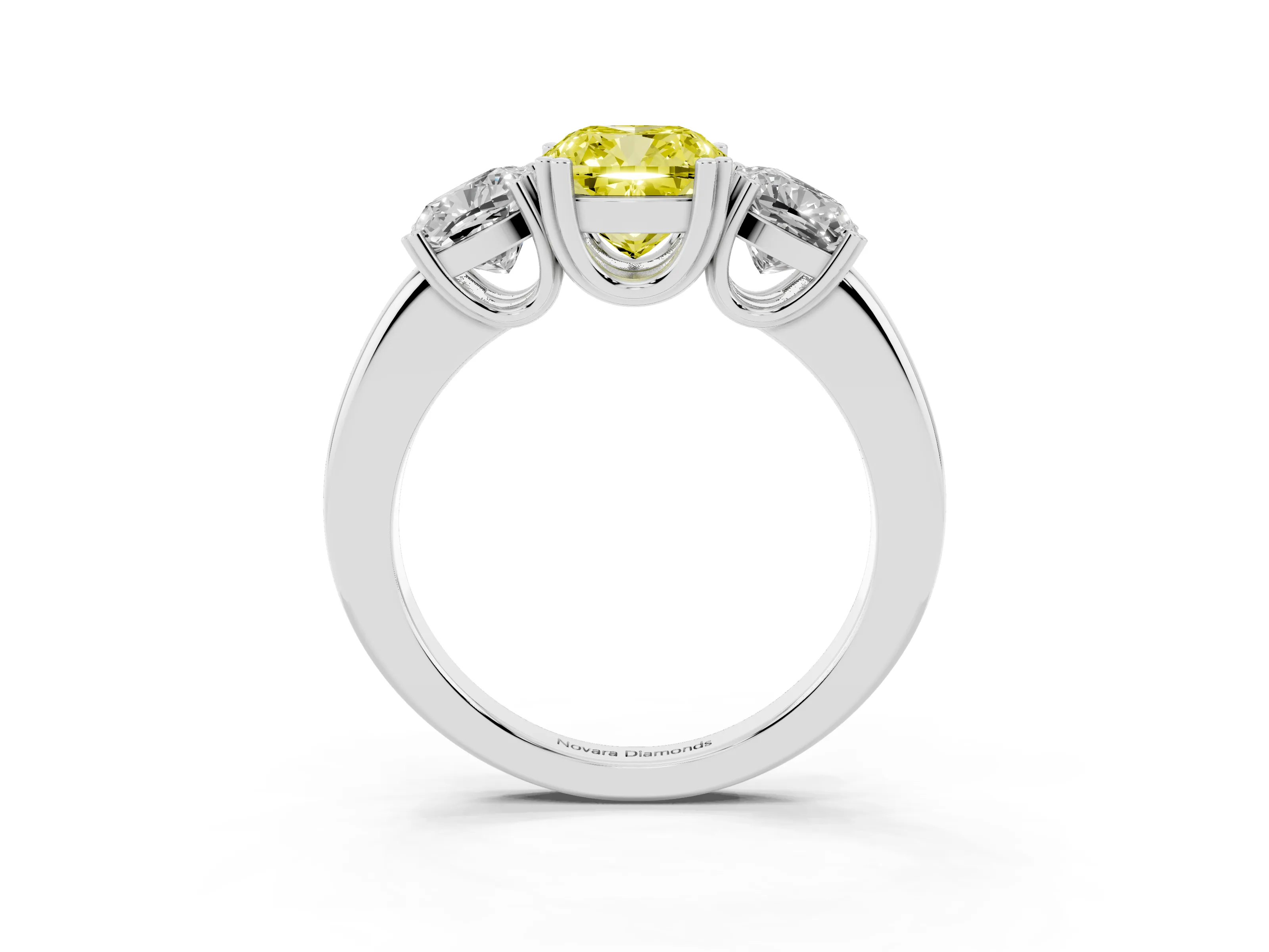 Fancy Yellow Cushion Cut Diamond Three-Stone Ring Set in Platinum with Polished Band and Prong Setting