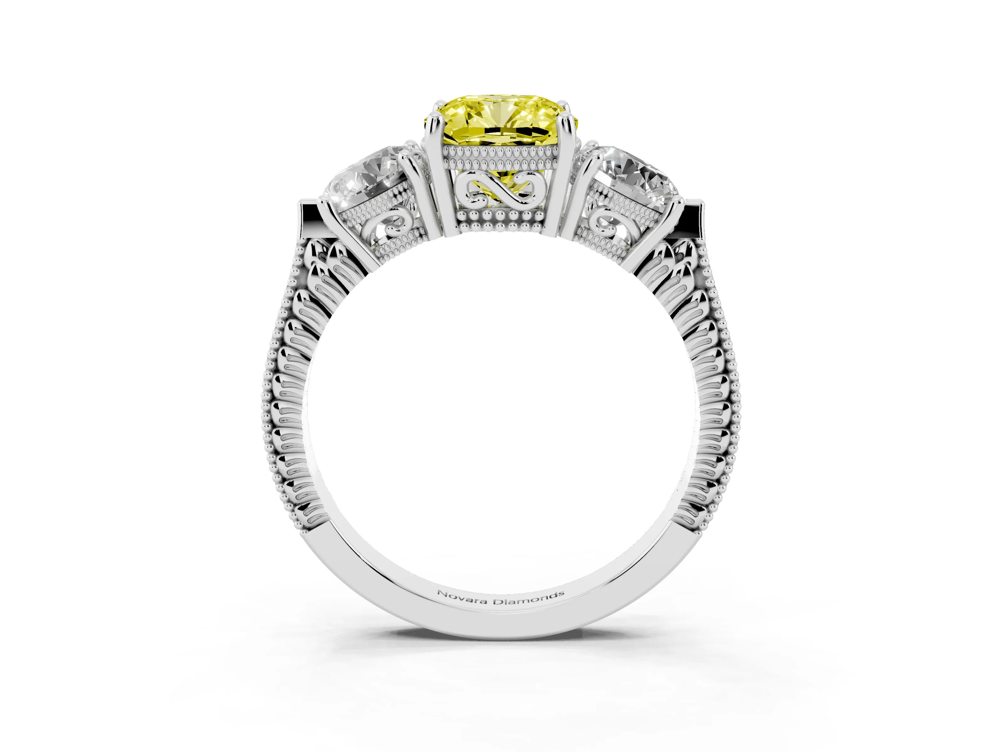 Fancy Yellow Cushion Cut Diamond Three-Stone Ring Set in Platinum with Milgrain Band
