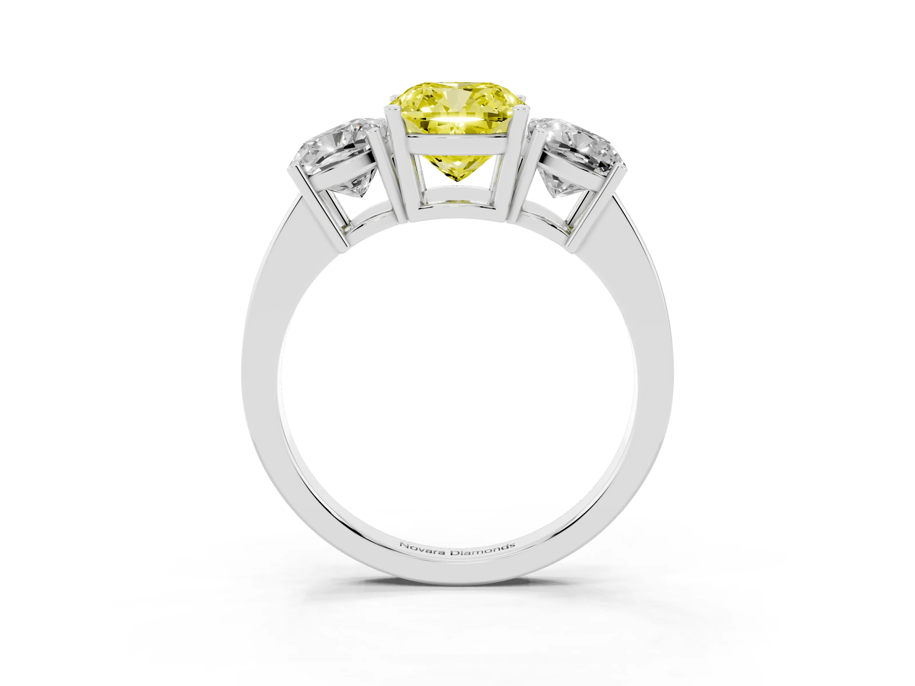 Fancy Yellow Cushion Cut Diamond Three-Stone Engagement Ring Set in Platinum with Flat Band