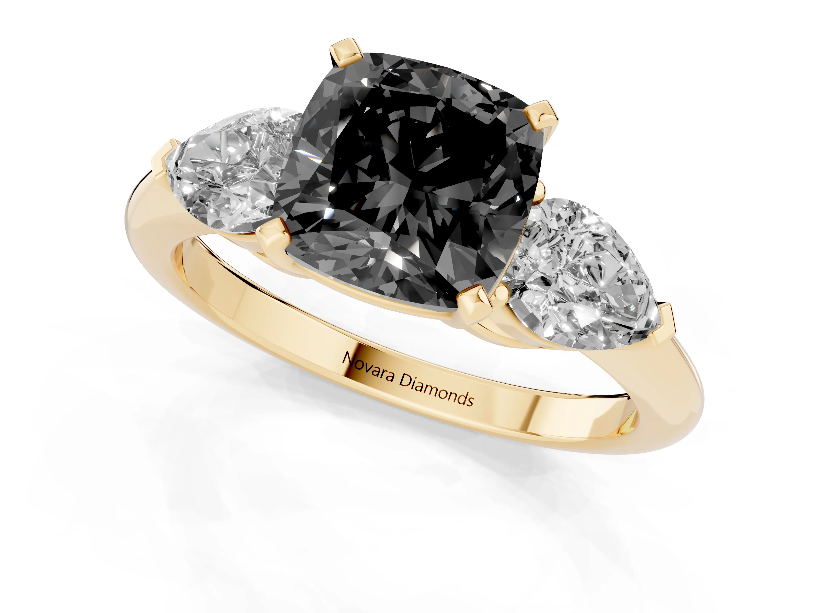 Fancy Black Three-Stone Cushion Cut Diamond Ring Set in Yellow gold with Pear Side Stones and Prong Setting