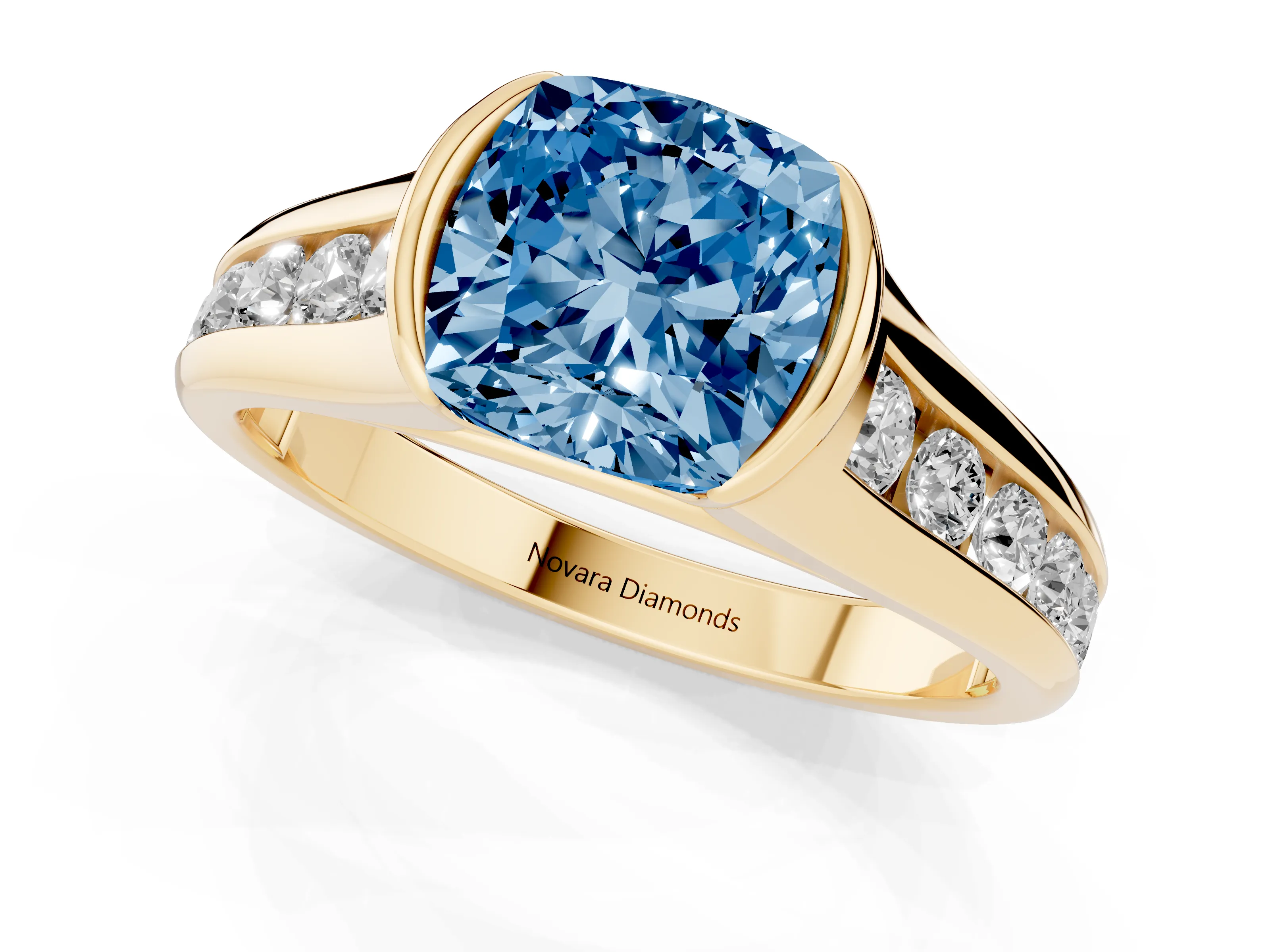 Fancy Blue Cushion Cut Diamond Bezel-Set Solitaire Ring Set in Yellow gold with Channel-Set Band