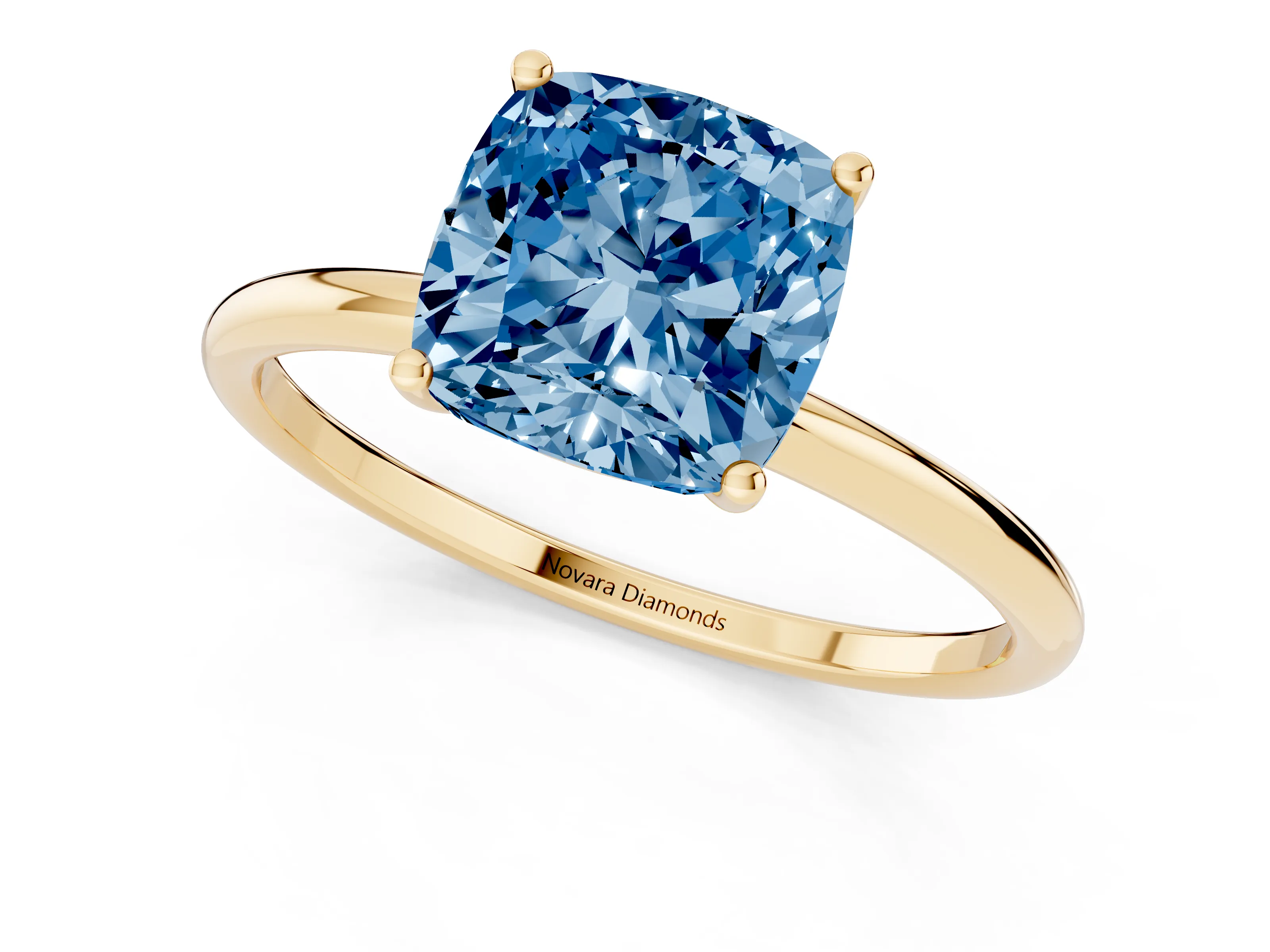 Fancy Blue Cushion Cut Diamond Solitaire Engagement Ring Set in Yellow gold with Thin Band and Prong Setting