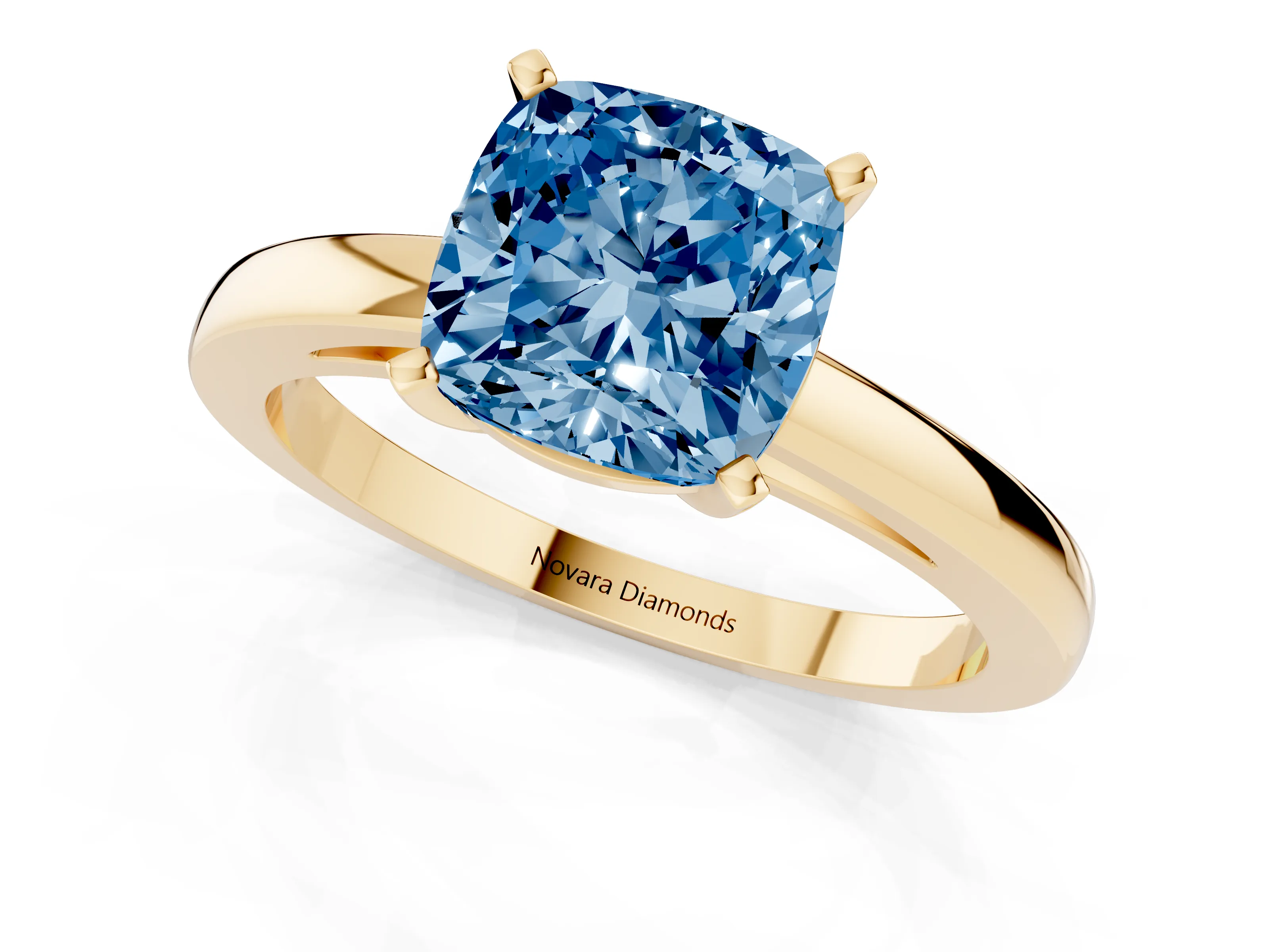 Fancy Blue Cushion Cut Diamond Solitaire Engagement Ring Set in Yellow gold with Prong Setting on a Classic Band