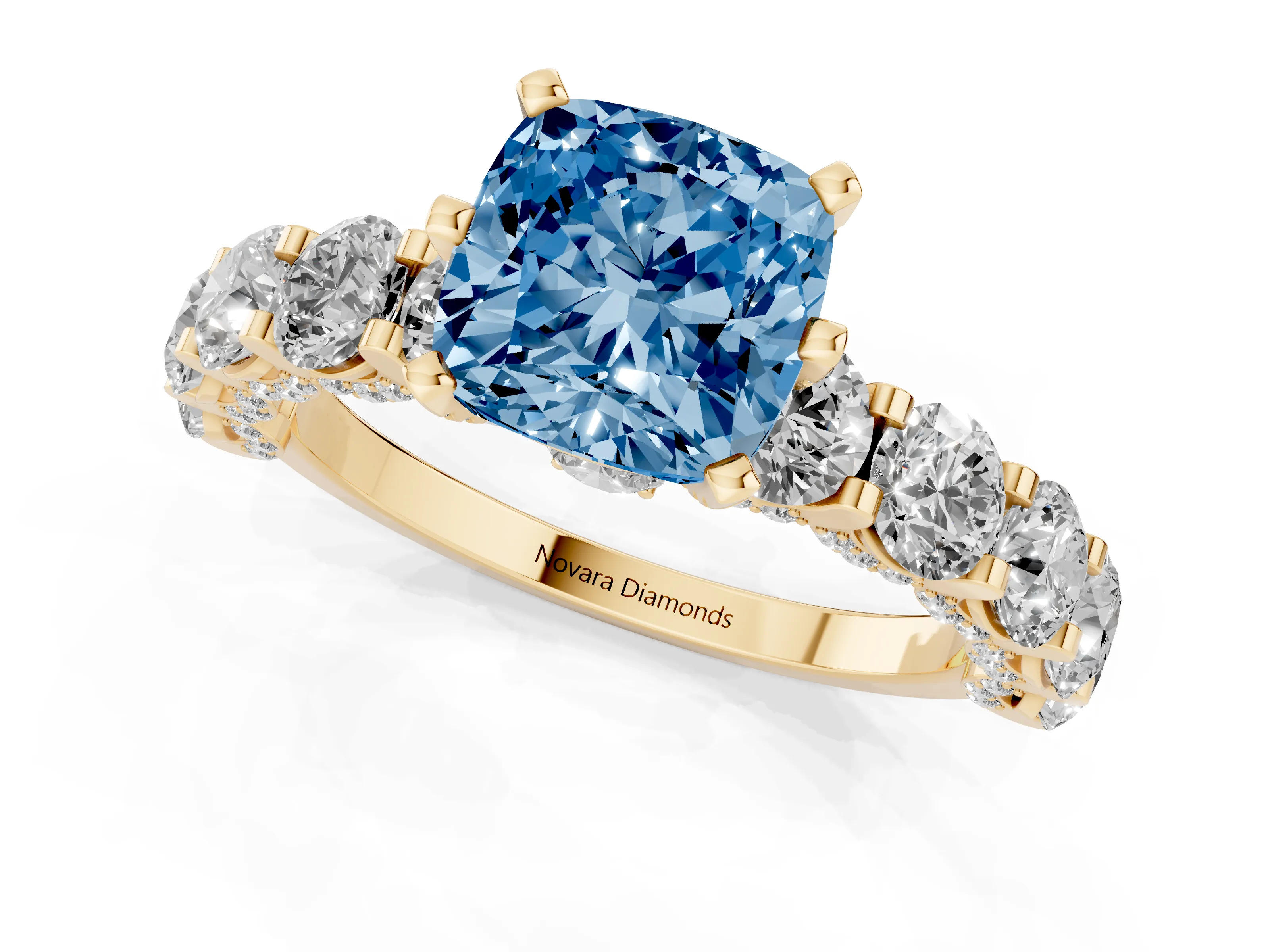 Fancy Blue Cushion Cut Diamond Side Stone Ring Set in Yellow gold with Alternating Round and Oval Side Stones