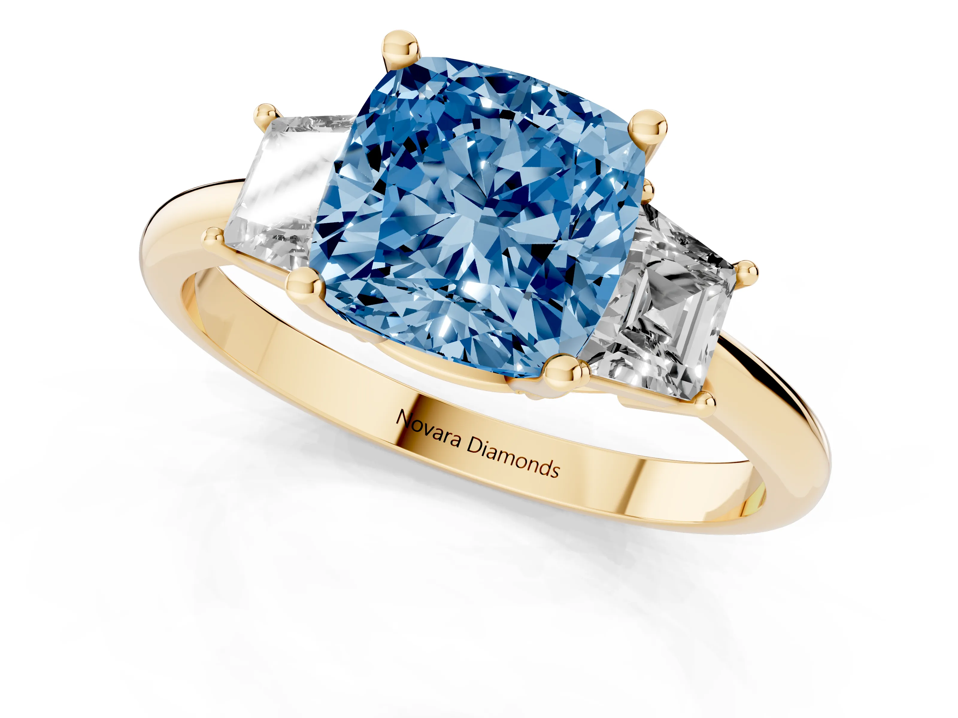 Fancy Blue Cushion Cut Diamond Three-Stone Ring Set in Yellow gold with Trapezoid Side Stones and Prong Setting