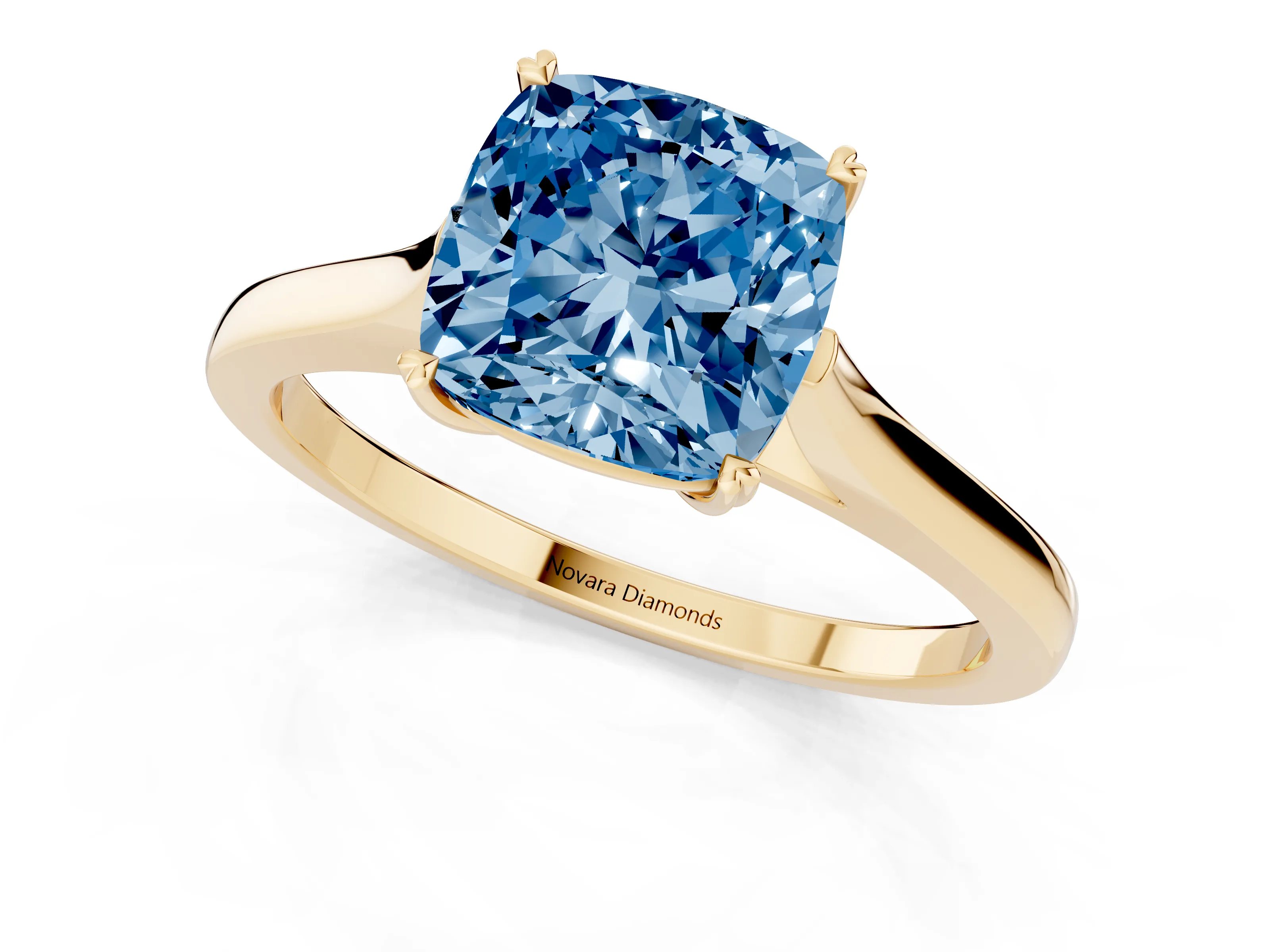 Fancy Blue Cushion Cut Diamond Solitaire Heart Prong Engagement Ring Set in Yellow gold with Tapered Band