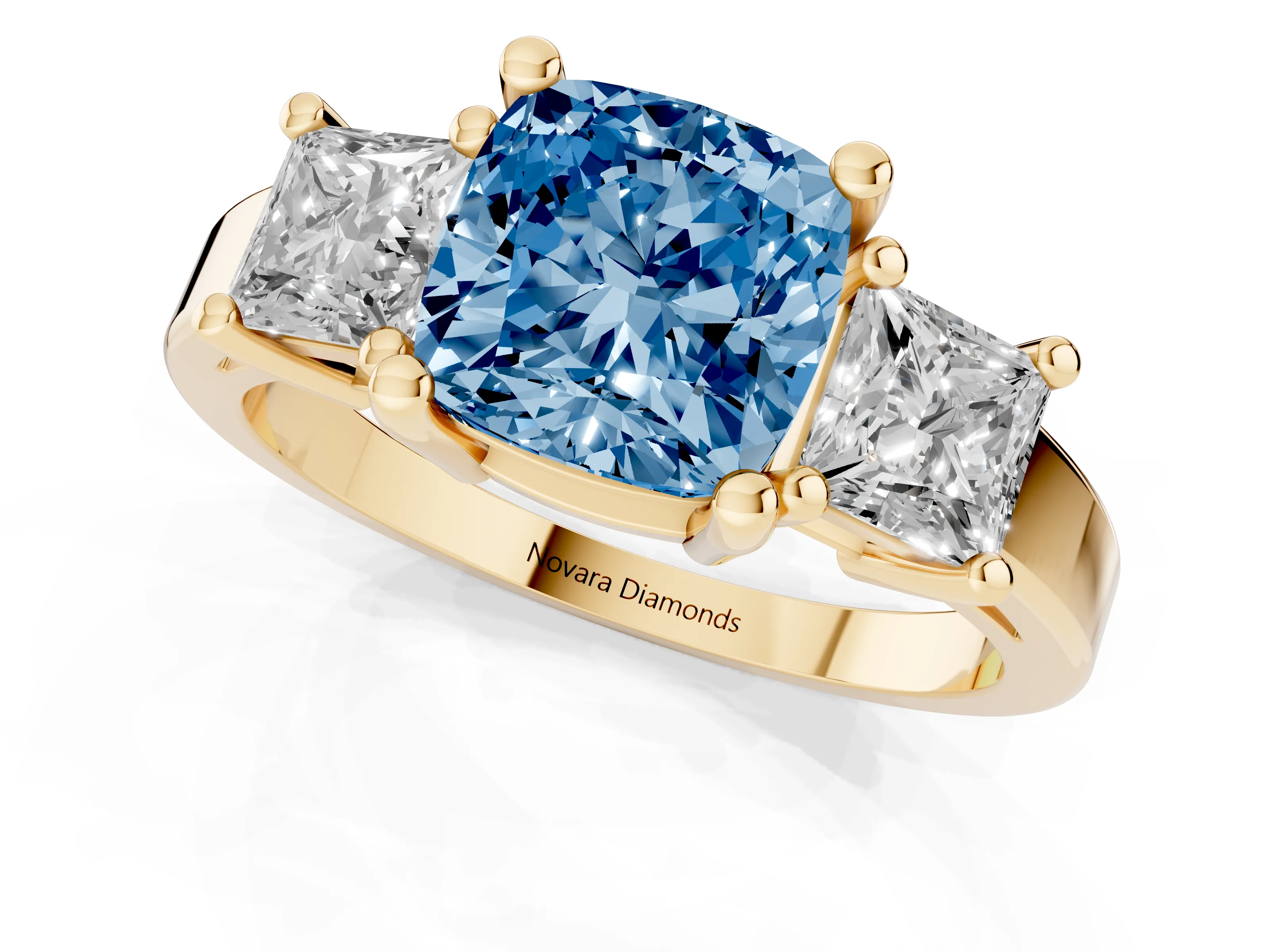 Fancy Blue Three-Stone Cushion Cut Diamond Solitaire Ring Set in Yellow gold with Prong Setting