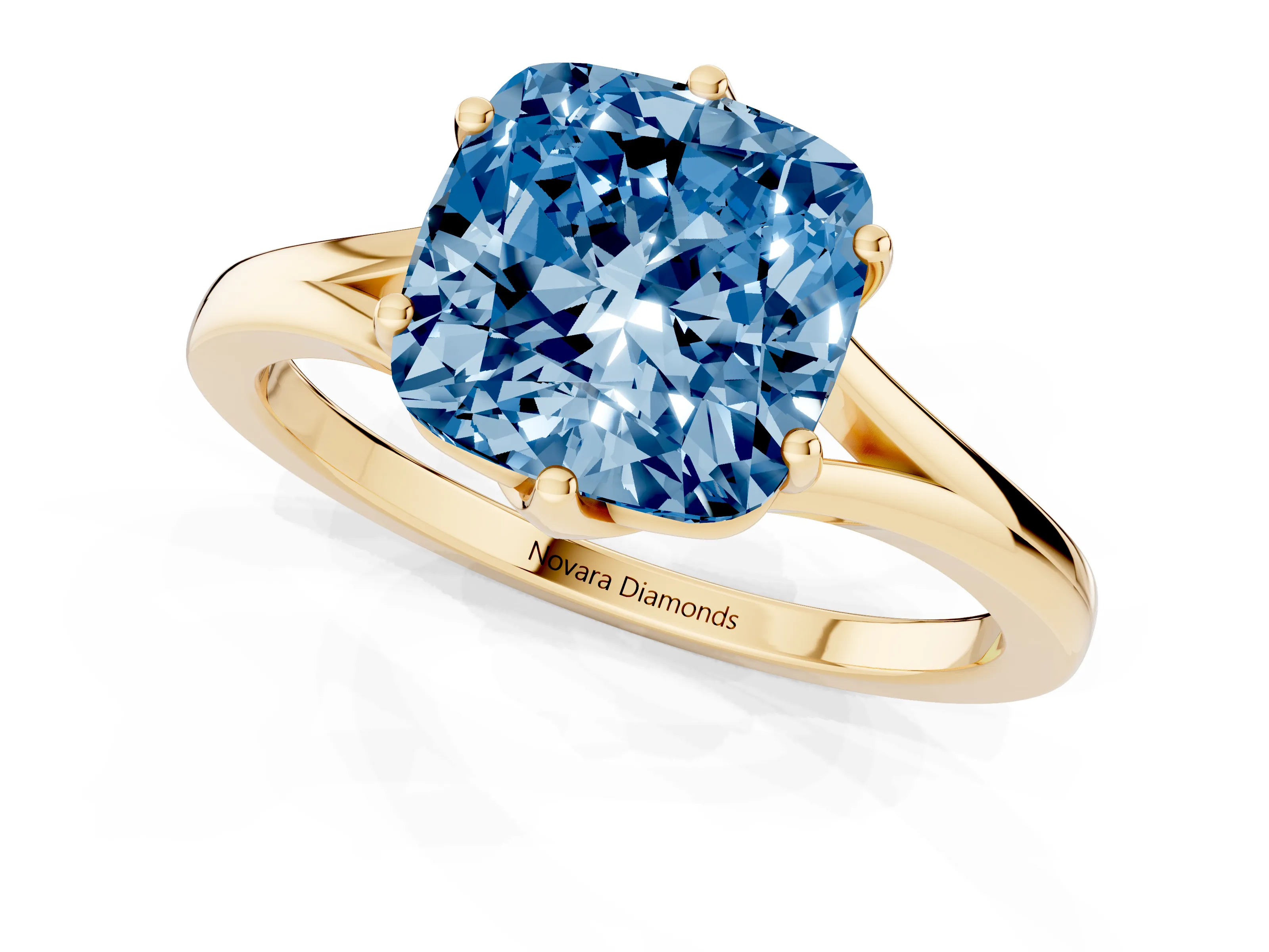Fancy Blue Cushion Cut Diamond Solitaire Ring Set in Yellow gold with Polished Tapered Band and Prong Setting