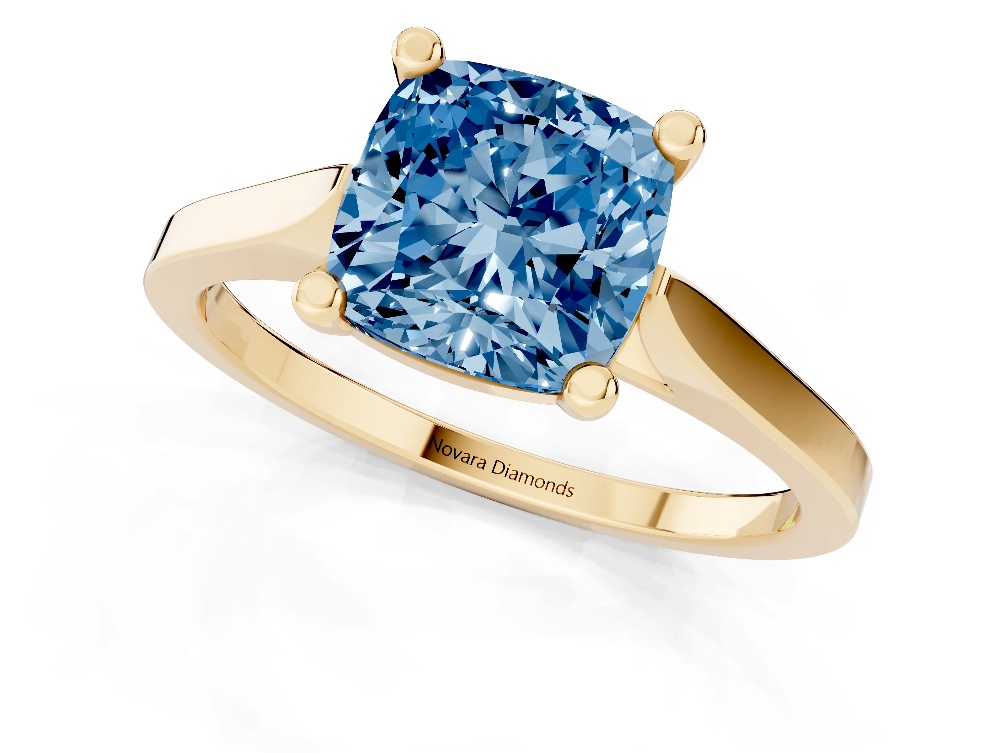 Fancy Blue Cushion Cut Diamond Solitaire Ring Set in Yellow gold with Prong Setting and Tapered Band