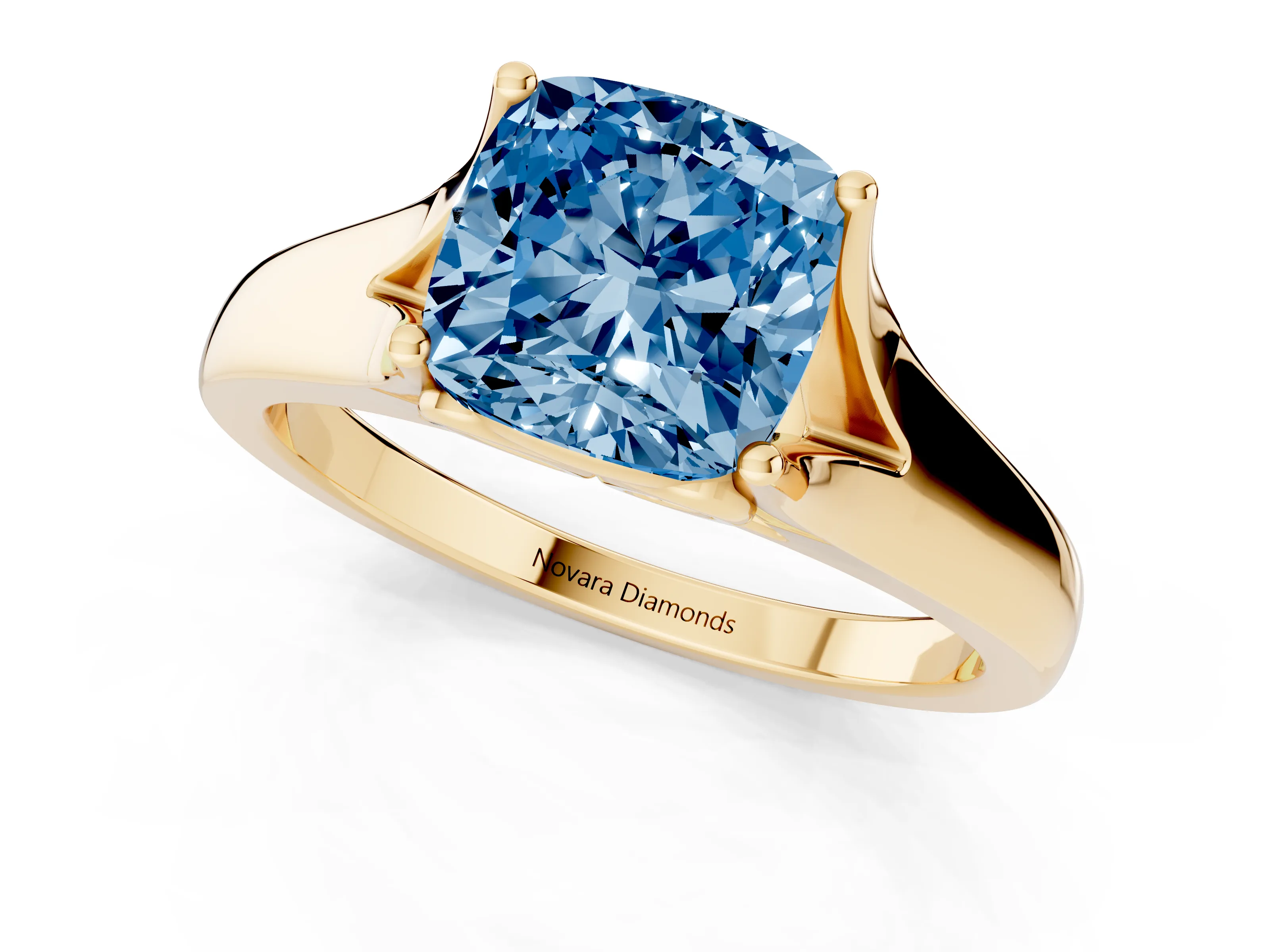 Fancy Blue Cushion Cut Diamond Solitaire Ring Set in Yellow gold with Arched Cathedral Band and Prong Setting