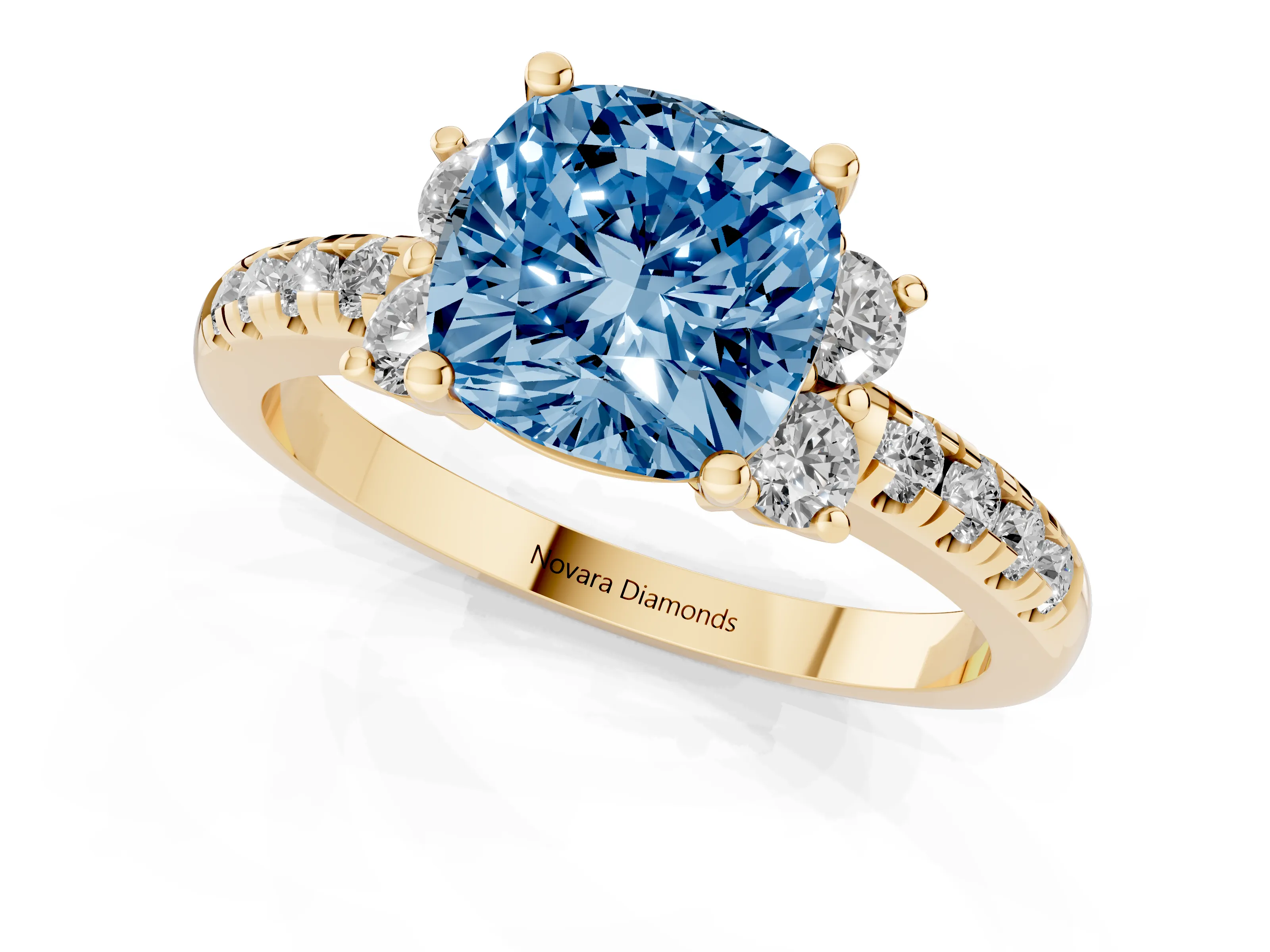 Fancy Blue Cushion Cut Diamond Three-Stone Pavé Ring Set in Yellow gold with Prong Setting