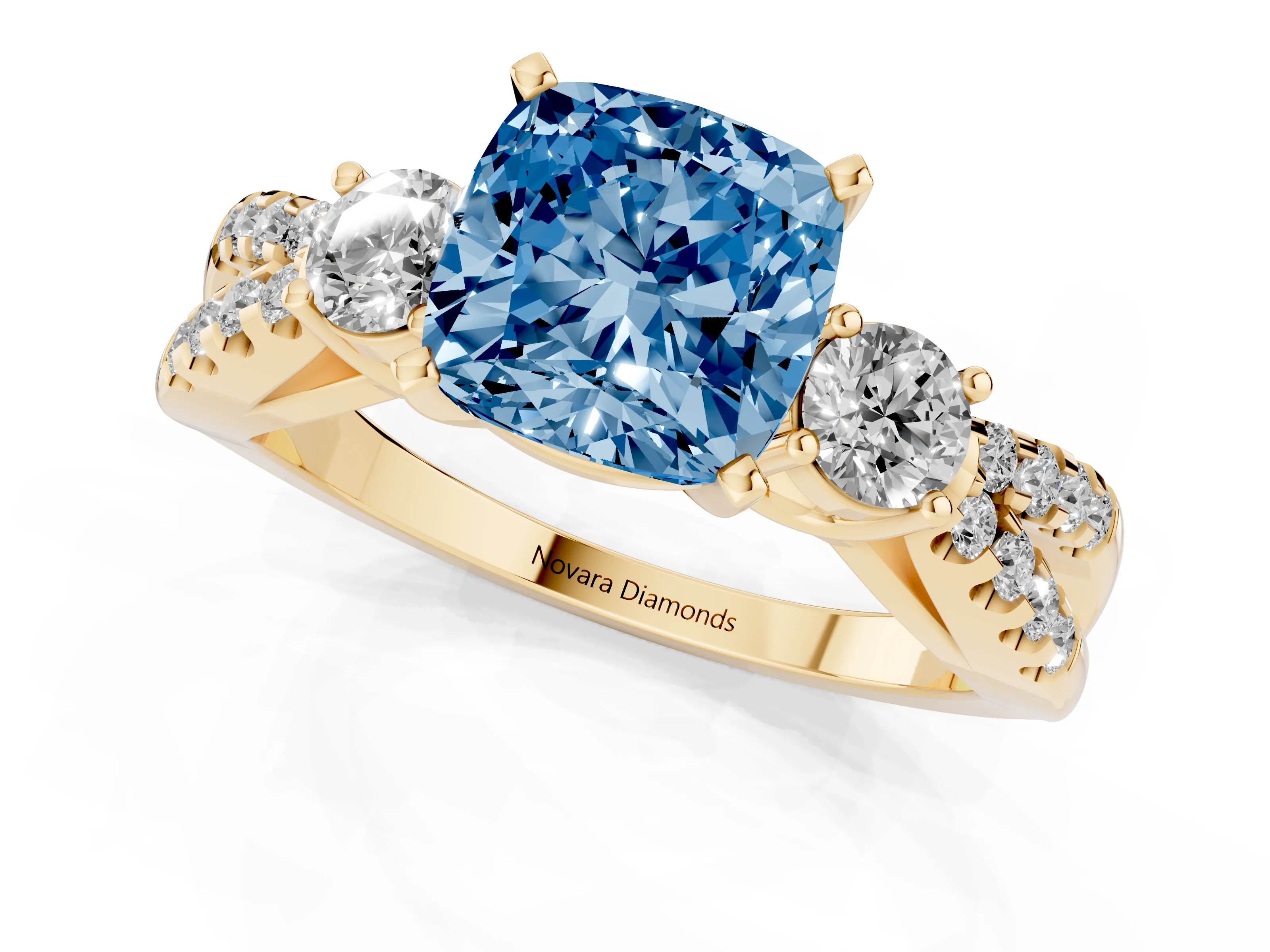 Fancy Blue Cushion Cut Diamond Three-Stone Ring Set in Yellow gold with Pavé Split Shank and Prong Setting